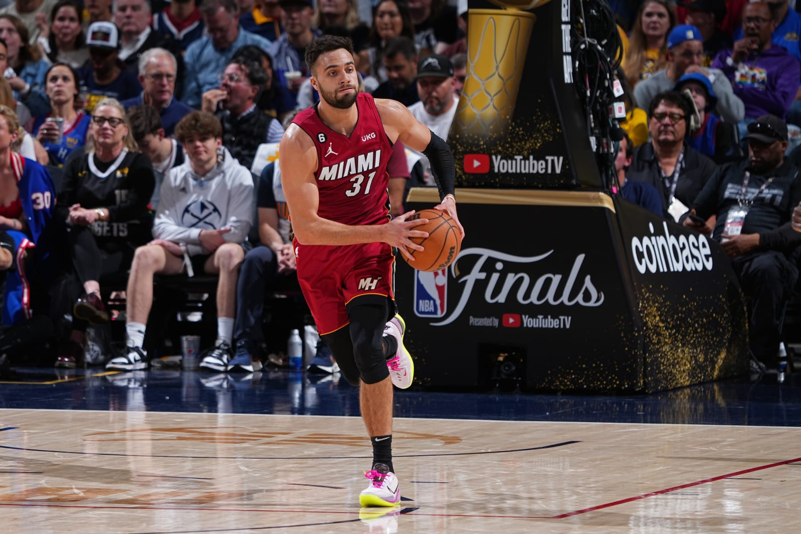 DENVER, CO - JUNE 12: Max Strus #31 of the Miami Heat looks to pass the ball against the Denver Nuggets during Game Five of the 2023 NBA Finals on June 12, 2023 at Ball Arena in Denver, Colorado. NOTE TO USER: User expressly acknowledges and agrees that, by downloading and or using this Photograph, user is consenting to the terms and conditions of the Getty Images License Agreement. Mandatory Copyright Notice: Copyright 2023 NBAE (Photo by Garrett Ellwood/NBAE via Getty Images)