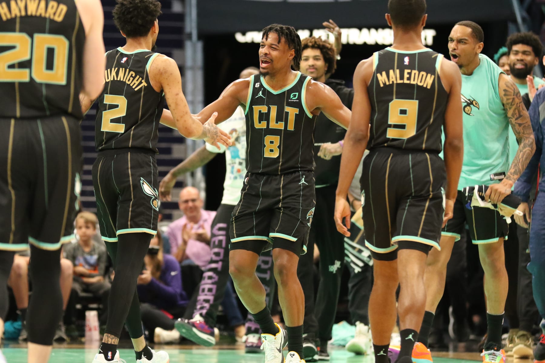 CHARLOTTE, NC - MARCH 26: Dennis Smith Jr. #8 of the Charlotte Hornets celebrates during the game against the Dallas Mavericks on March 26, 2023 at Spectrum Center in Charlotte, North Carolina. NOTE TO USER: User expressly acknowledges and agrees that, by downloading and or using this photograph, User is consenting to the terms and conditions of the Getty Images License Agreement.  Mandatory Copyright Notice:  Copyright 2023 NBAE (Photo by Brock Williams-Smith/NBAE via Getty Images)