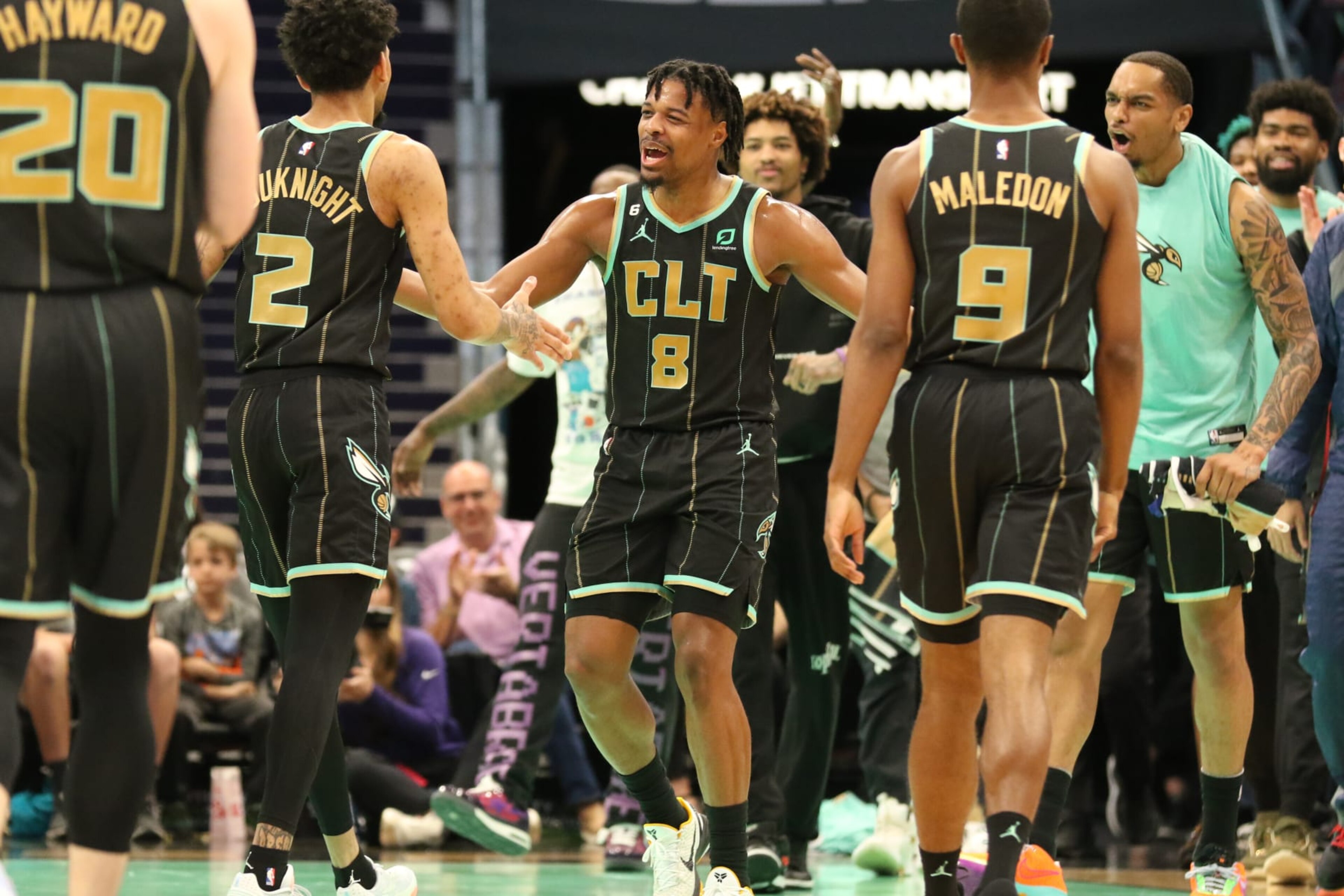 CHARLOTTE, NC - MARCH 26: Dennis Smith Jr. #8 of the Charlotte Hornets celebrates during the game against the Dallas Mavericks on March 26, 2023 at Spectrum Center in Charlotte, North Carolina. NOTE TO USER: User expressly acknowledges and agrees that, by downloading and or using this photograph, User is consenting to the terms and conditions of the Getty Images License Agreement.  Mandatory Copyright Notice:  Copyright 2023 NBAE (Photo by Brock Williams-Smith/NBAE via Getty Images)
