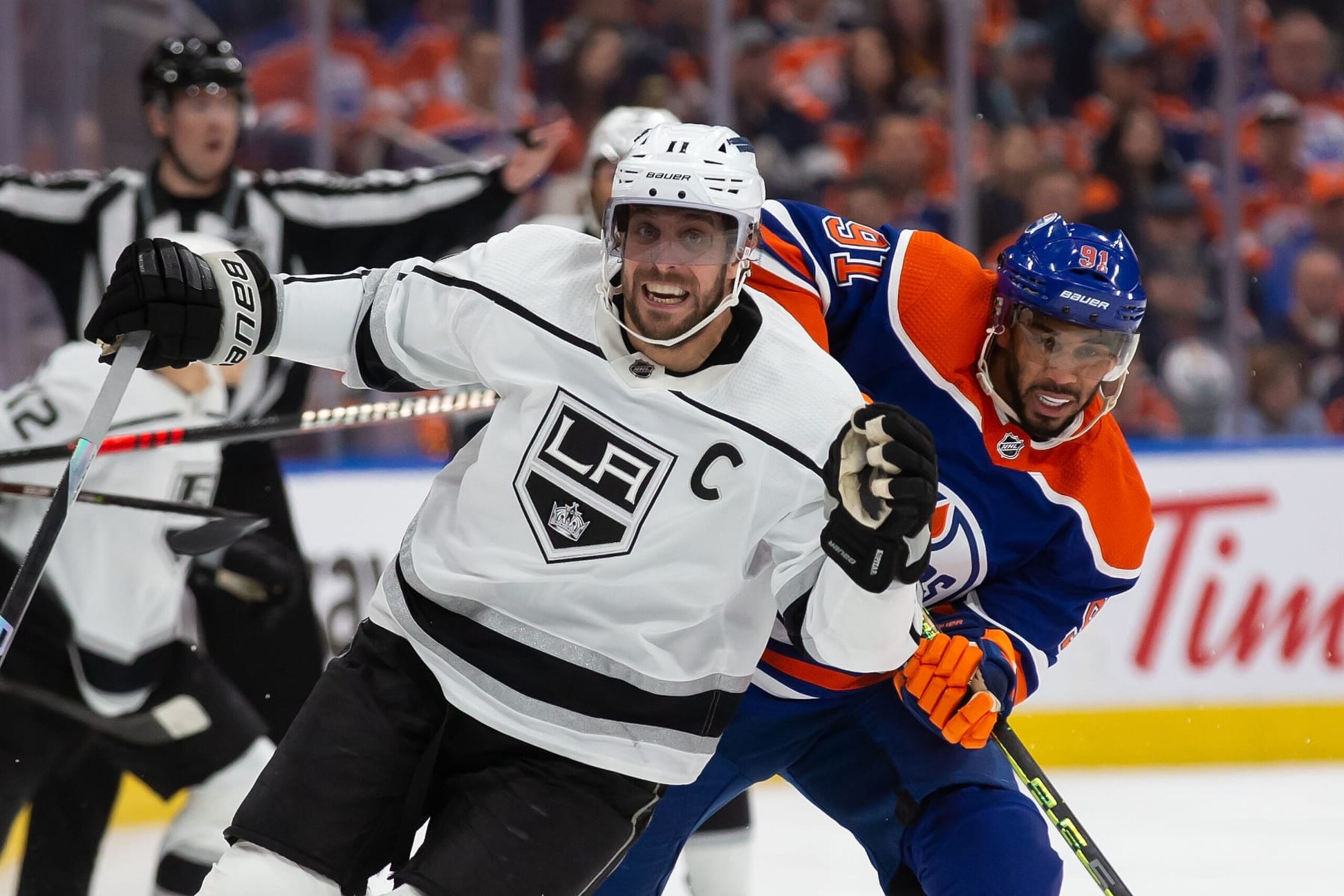 EDMONTON, AB - APRIL 25: Evander Kane #91 of the Edmonton Oilers battles against Anze Kopitar #11 of the Los Angeles Kings during the first period in Game Five of the First Round of the 2023 Stanley Cup Playoffs at Rogers Place on April 25, 2023, in Edmonton, Canada. (Photo by Codie McLachlan/Getty Images) EDMONTON, AB - APRIL 25: Evander Kane #91 of the Edmonton Oilers battles against Anze Kopitar #11 of the Los Angeles Kings during the first period in Game Five of the First Round of the 2023 Stanley Cup Playoffs at Rogers Place on April 25, 2023, in Edmonton, Canada. (Photo by Codie McLachlan/Getty Images)