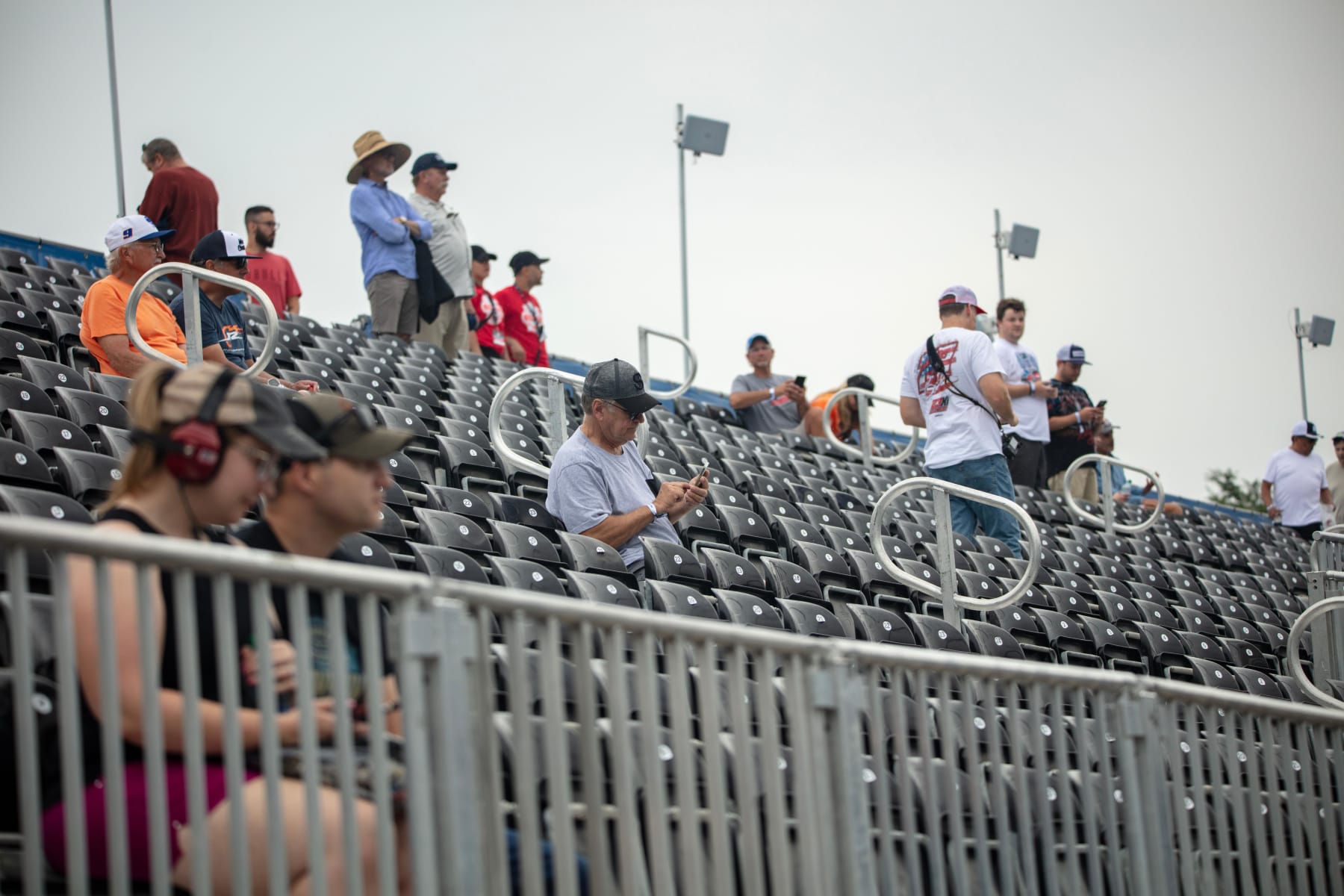 Spectators watch qualifying races around the Nascar street course in Chicago, Illinois, on Saturday, July 1, 2023. Nascar is about to hit the road in Chicago for the first-ever street race in its marquee series, but for the city, the spectacle means plenty of hassle and it is likely to produce only a limited payoff. Photographer: Jim Vondruska/Bloomberg via Getty Images