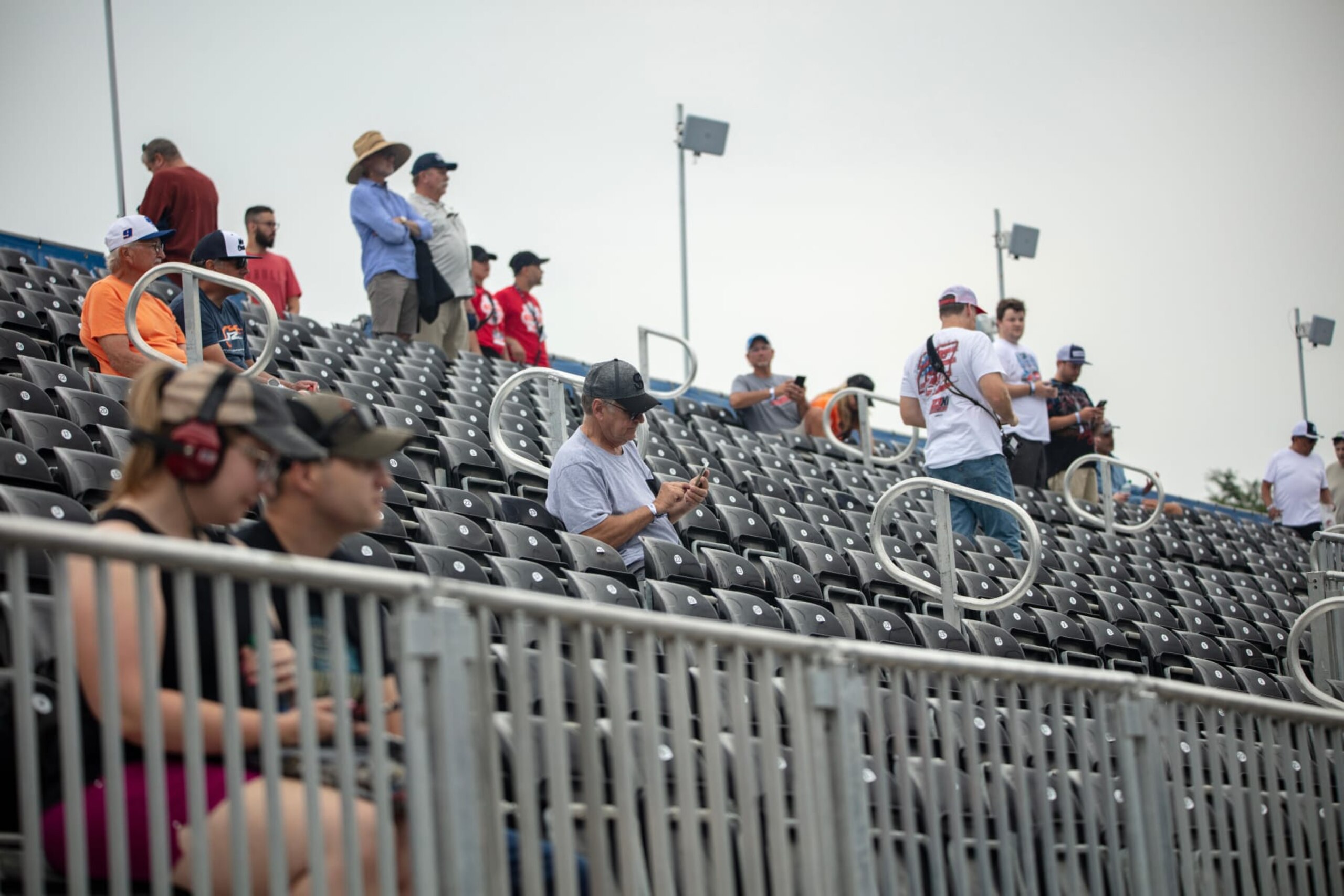 Spectators watch qualifying races around the Nascar street course in Chicago, Illinois, on Saturday, July 1, 2023. Nascar is about to hit the road in Chicago for the first-ever street race in its marquee series, but for the city, the spectacle means plenty of hassle and it is likely to produce only a limited payoff. Photographer: Jim Vondruska/Bloomberg via Getty Images Spectators watch qualifying races around the Nascar street course in Chicago, Illinois, on Saturday, July 1, 2023. Nascar is about to hit the road in Chicago for the first-ever street race in its marquee series, but for the city, the spectacle means plenty of hassle and it is likely to produce only a limited payoff. Photographer: Jim Vondruska/Bloomberg via Getty Images