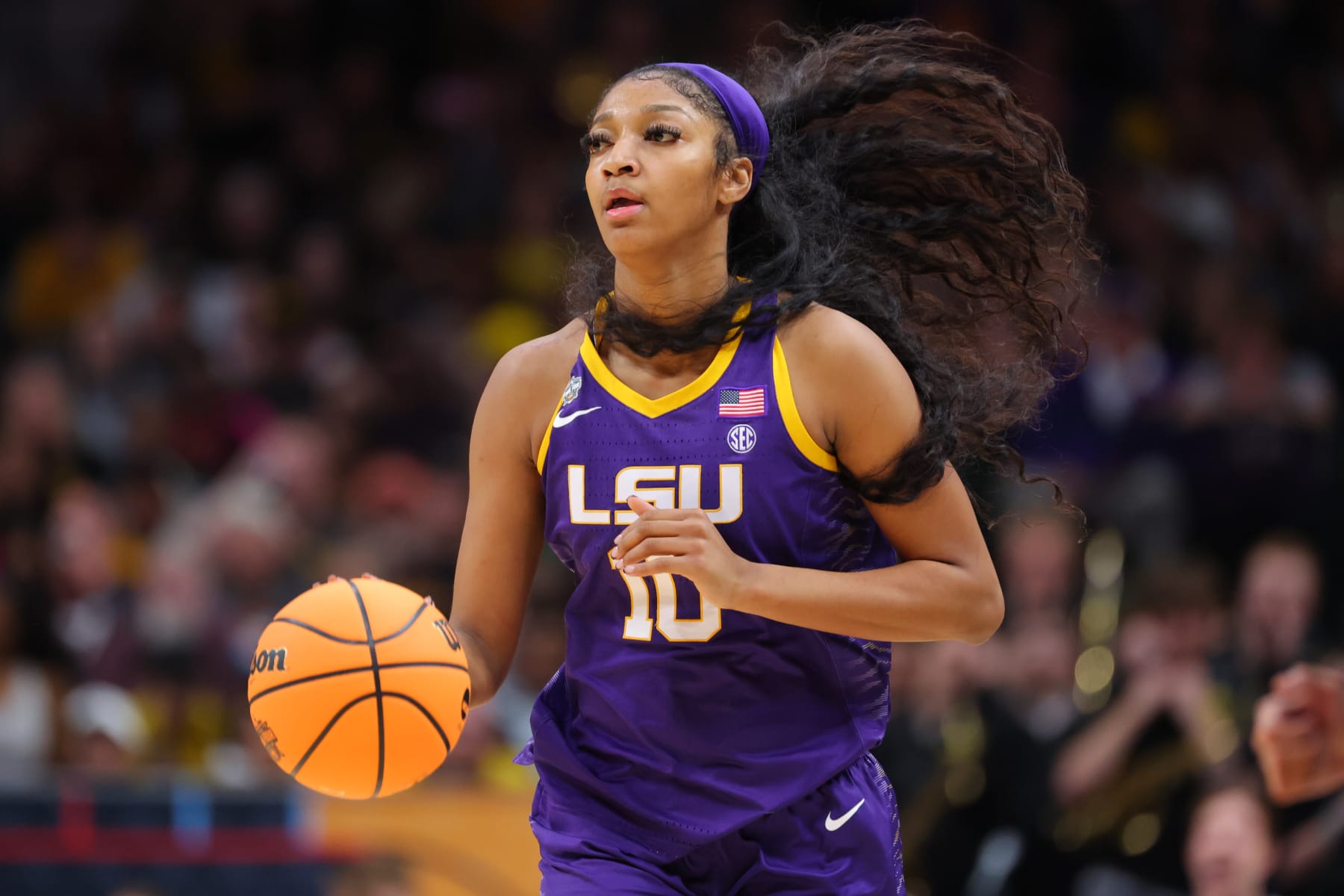 DALLAS, TX - APRIL 02: Angel Reese #10 of the LSU Lady Tigers handles the ball against the Iowa Hawkeyes during the 2023 NCAA Women's Basketball Tournament National Championship at American Airlines Center on April 2, 2023 in Dallas, Texas. (Photo by C. Morgan Engel/NCAA Photos via Getty Images)
