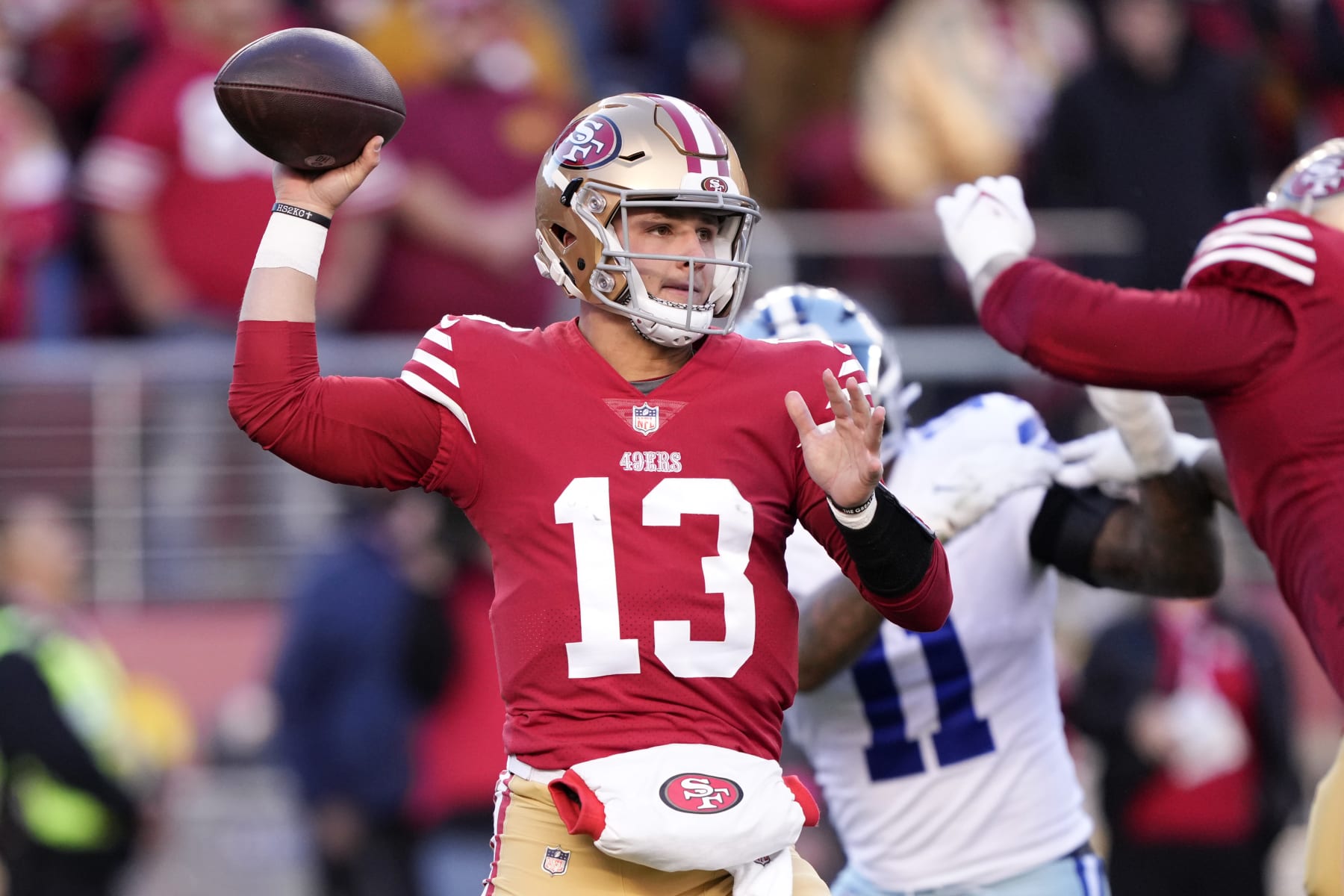 SANTA CLARA, CALIFORNIA - JANUARY 22: Brock Purdy #13 of the San Francisco 49ers throws a pass against the Dallas Cowboys during the first quarter in the NFC Divisional Playoff game at Levi's Stadium on January 22, 2023 in Santa Clara, California. (Photo by Thearon W. Henderson/Getty Images)