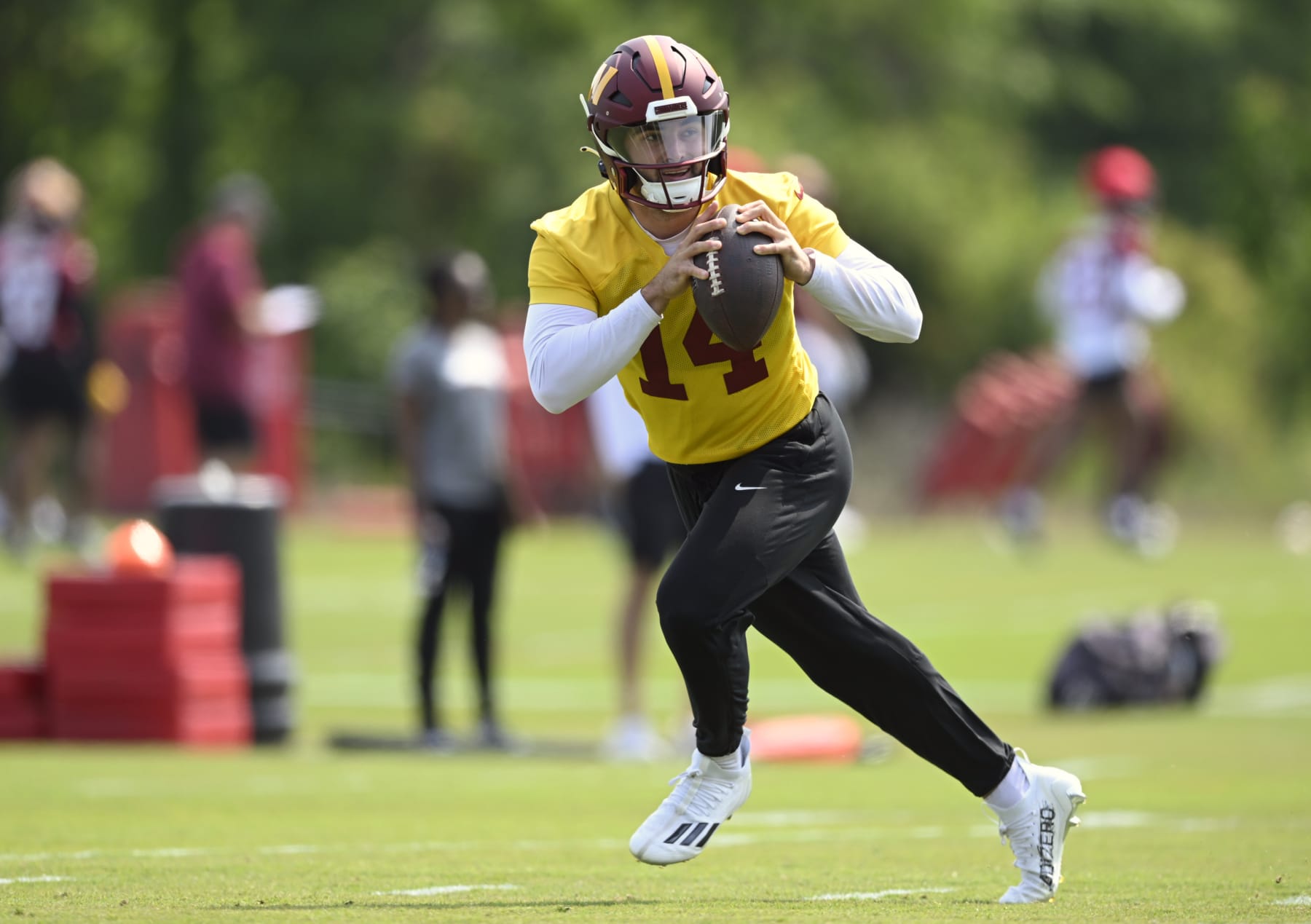 ASHBURN, VA - MAY 24: Washington Commanders quarterback Sam Howell (14)  during Washington Commanders OTA's at Commanders Park on May 24, 2023 in Ashburn, VA. (Photo by John McDonnell/The Washington Post via Getty Images)