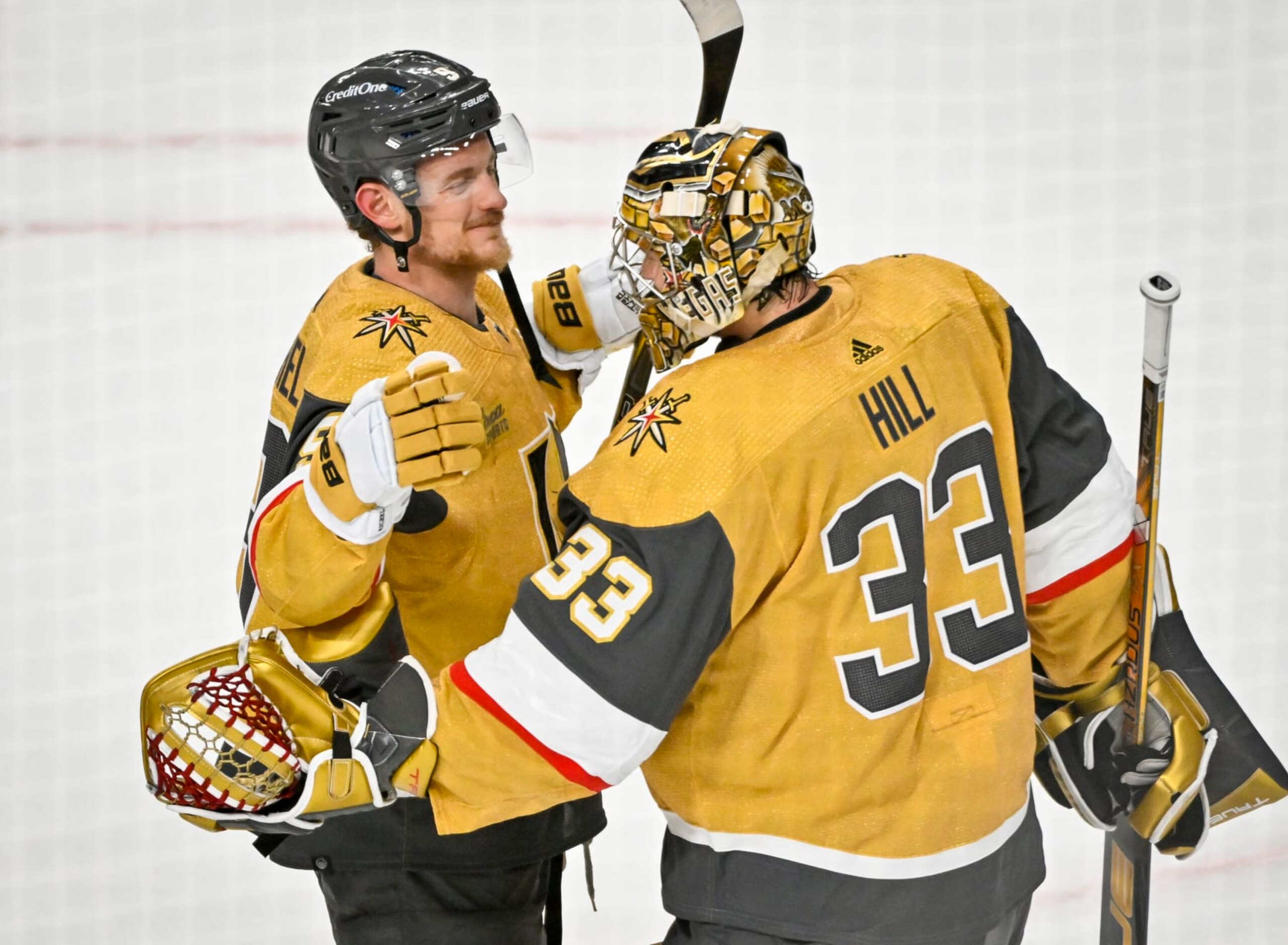 LAS VEGAS, NEVADA - JUNE 05: Adin Hill #33 of the Vegas Golden Knights celebrates with Jack Eichel #9 after a 7-2 victory against the Florida Panthers in Game Two of the 2023 NHL Stanley Cup Final at T-Mobile Arena on June 05, 2023 in Las Vegas, Nevada. (Photo by David Becker/NHLI via Getty Images)