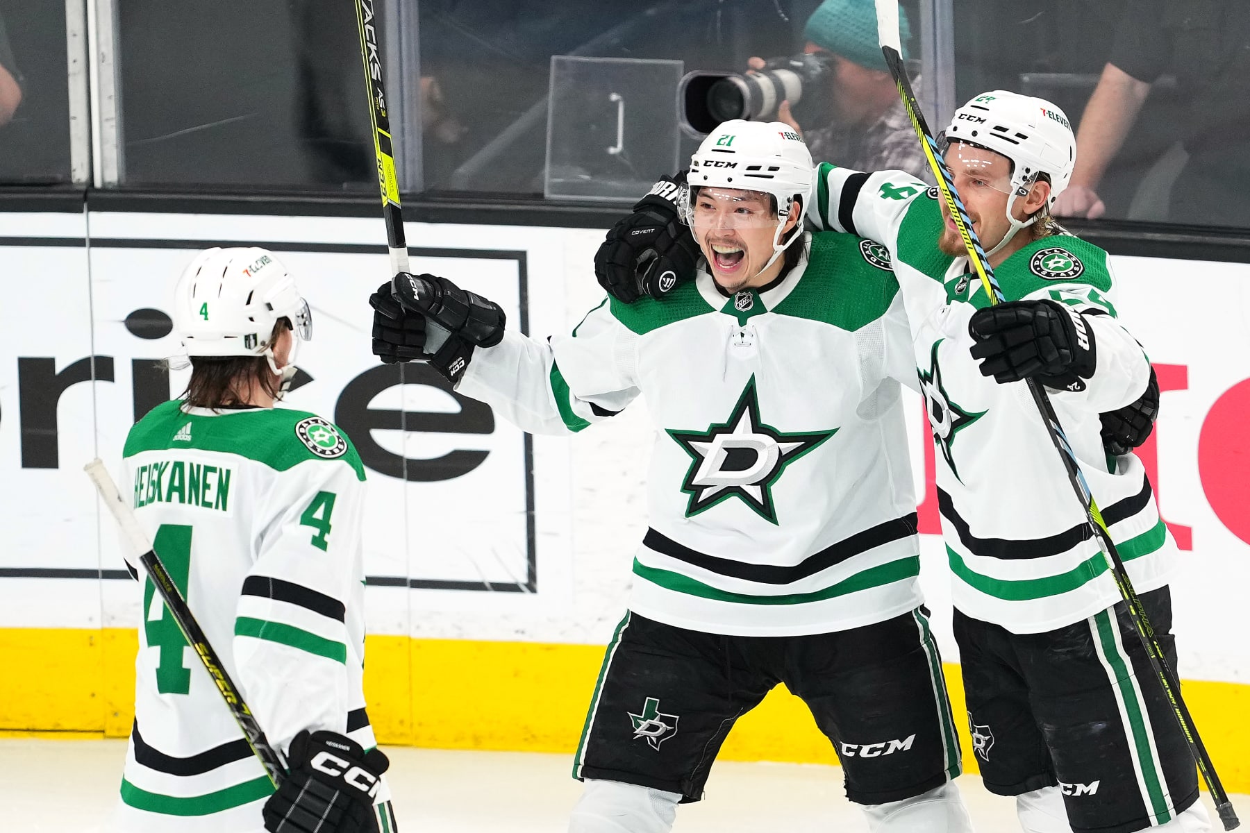 LAS VEGAS, NEVADA - MAY 27: Jason Robertson #21 of the Dallas Stars is congratulated by Miro Heiskanen #4 and Roope Hintz #24 after scoring a goal against the Vegas Golden Knights during the second period in Game Five of the Western Conference Final of the 2023 Stanley Cup Playoffs at T-Mobile Arena on May 27, 2023 in Las Vegas, Nevada. (Photo by Chris Unger/Getty Images) LAS VEGAS, NEVADA - MAY 27: Jason Robertson #21 of the Dallas Stars is congratulated by Miro Heiskanen #4 and Roope Hintz #24 after scoring a goal against the Vegas Golden Knights during the second period in Game Five of the Western Conference Final of the 2023 Stanley Cup Playoffs at T-Mobile Arena on May 27, 2023 in Las Vegas, Nevada. (Photo by Chris Unger/Getty Images)