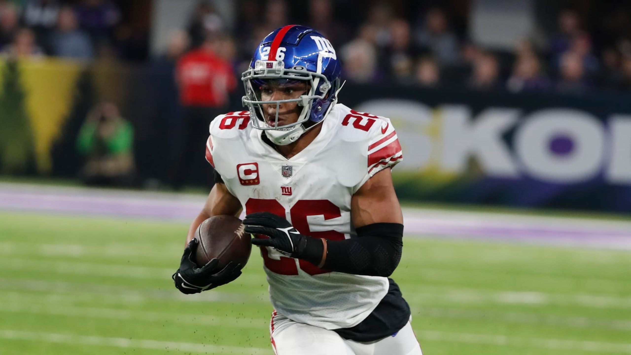 New York Giants' Saquon Barkley runs during the first half of an NFL wild card football game against the Minnesota Vikings Sunday, Jan. 15, 2023, in Minneapolis. (AP Photo/Bruce Kluckhohn) New York Giants' Saquon Barkley runs during the first half of an NFL wild card football game against the Minnesota Vikings Sunday, Jan. 15, 2023, in Minneapolis. (AP Photo/Bruce Kluckhohn)