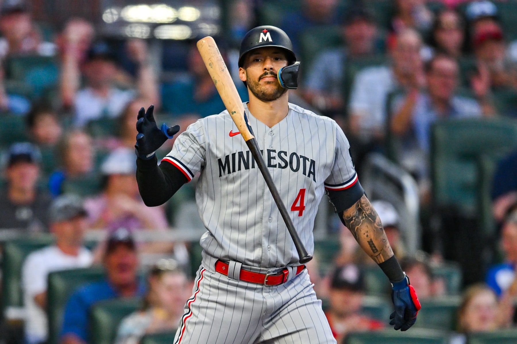 ATLANTA, GA  JUNE 27:  Minnesota shortstop Carlos Correa (4) reacts after striking out during the MLB game between the Minnesota Twins and the Atlanta Braves on June 27th, 2023 at Truist Park in Atlanta, GA. (Photo by Rich von Biberstein/Icon Sportswire via Getty Images)
