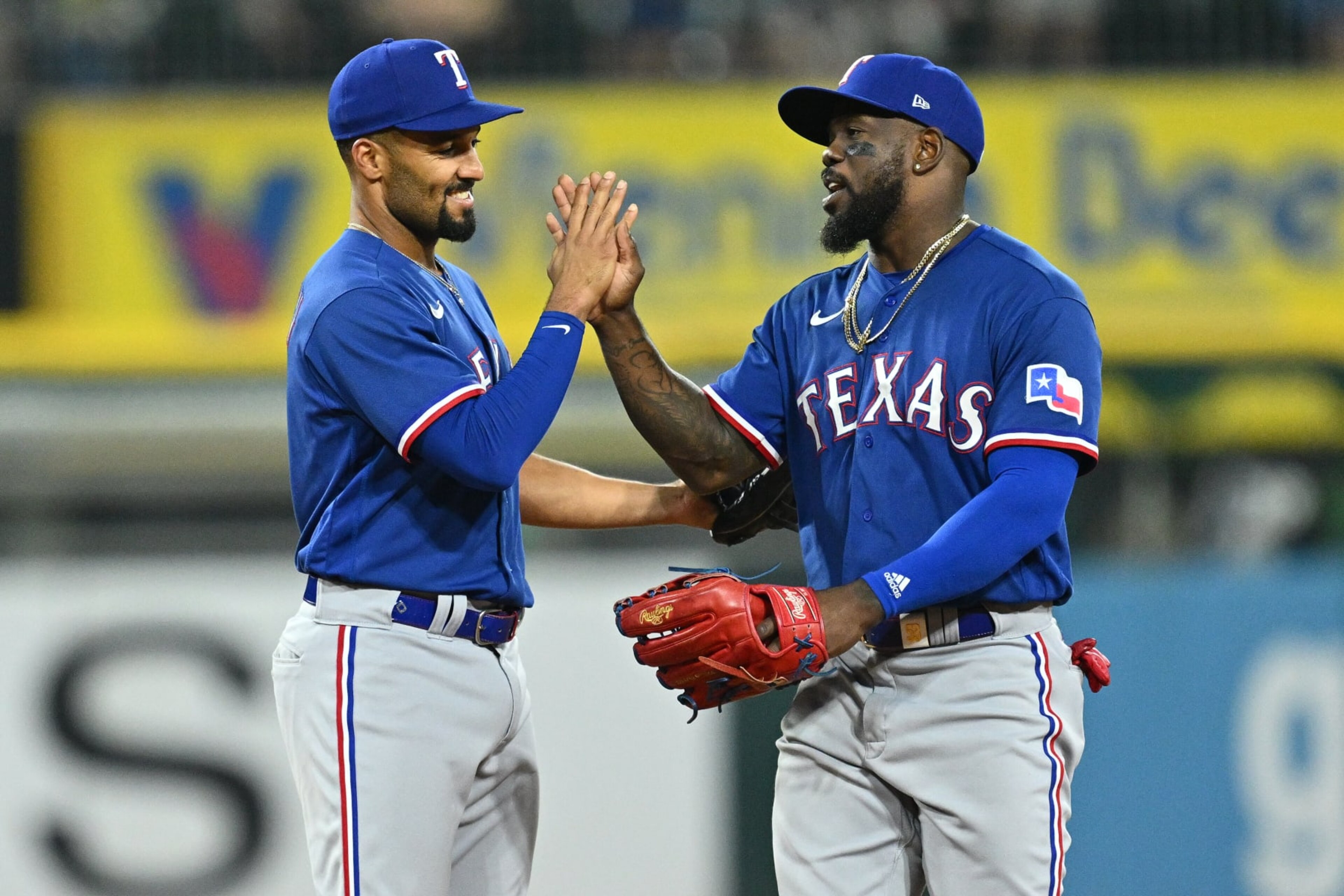 Texas' Marcus Semien and Adolis Garcia Texas' Marcus Semien and Adolis Garcia