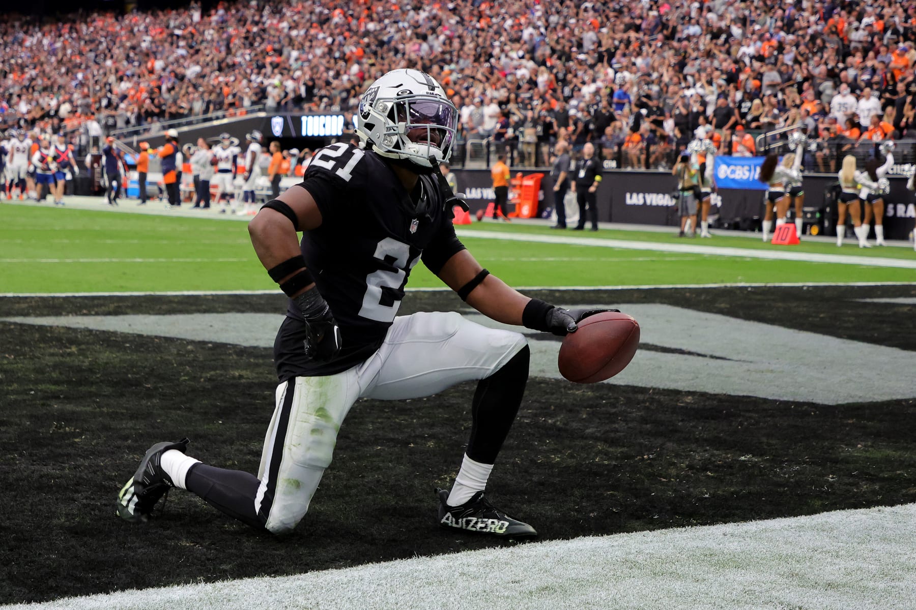 LAS VEGAS, NEVADA - OCTOBER 02: Amik Robertson #21 of the Las Vegas Raiders celebrates after recovering a fumble and scoring a 68-yard touchdown in the second quarter against the Denver Broncos at Allegiant Stadium on October 02, 2022 in Las Vegas, Nevada. (Photo by Ethan Miller/Getty Images)