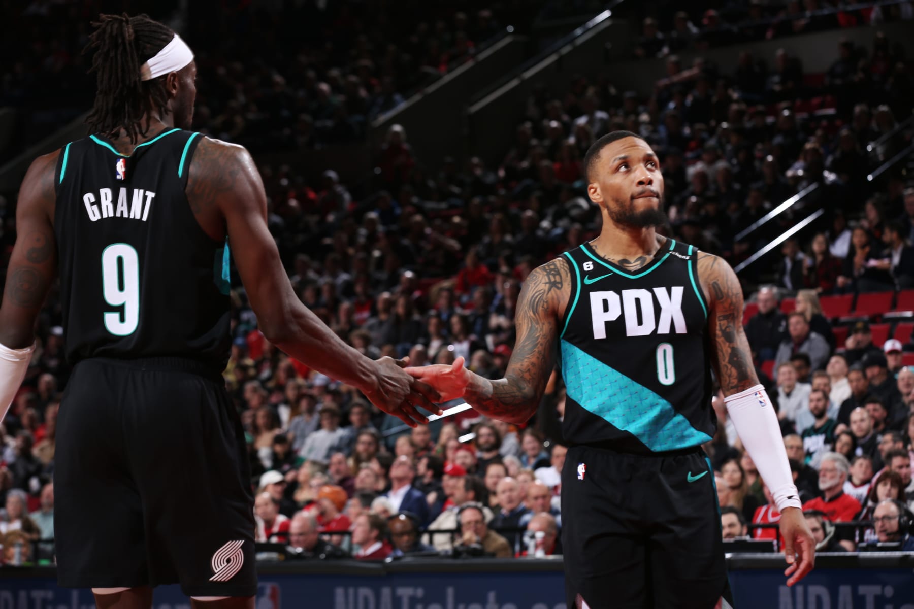 Jerami Grant and Damian Lillard