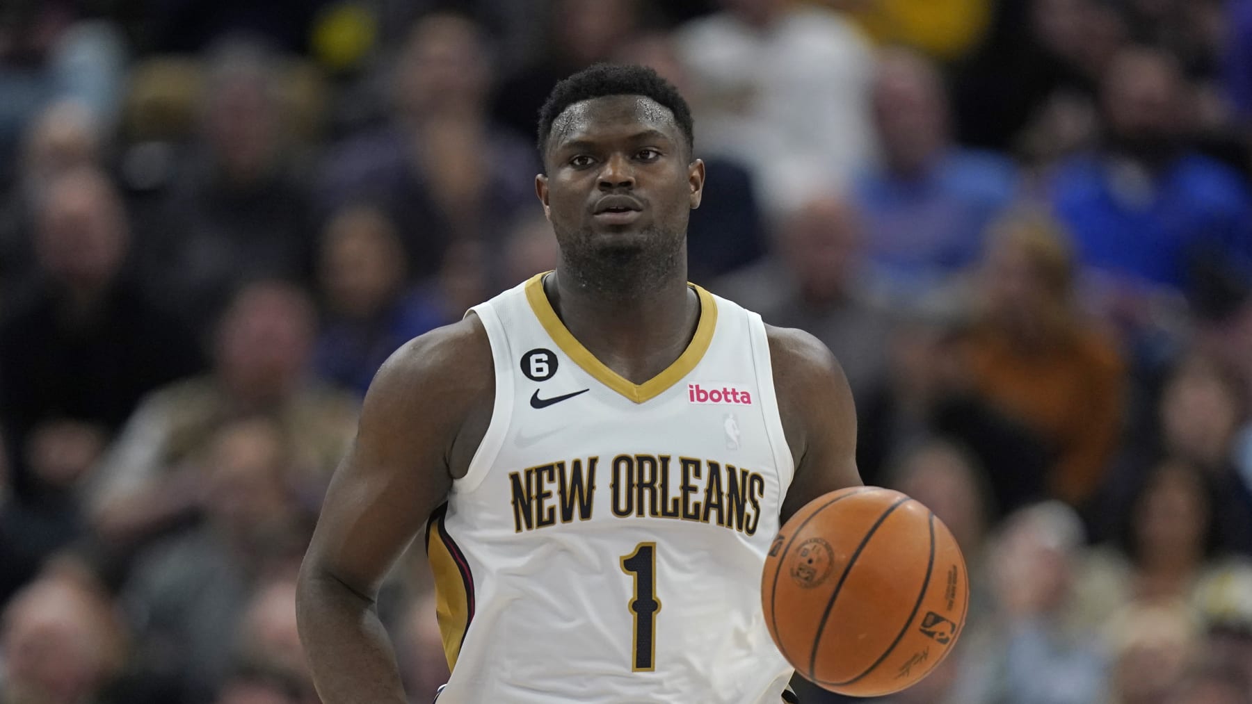 New Orleans Pelicans forward Zion Williamson (1) brings the ball up court during the second half of an NBA basketball game against the Utah Jazz Thursday, Dec. 15, 2022, in Salt Lake City. (AP Photo/Rick Bowmer)