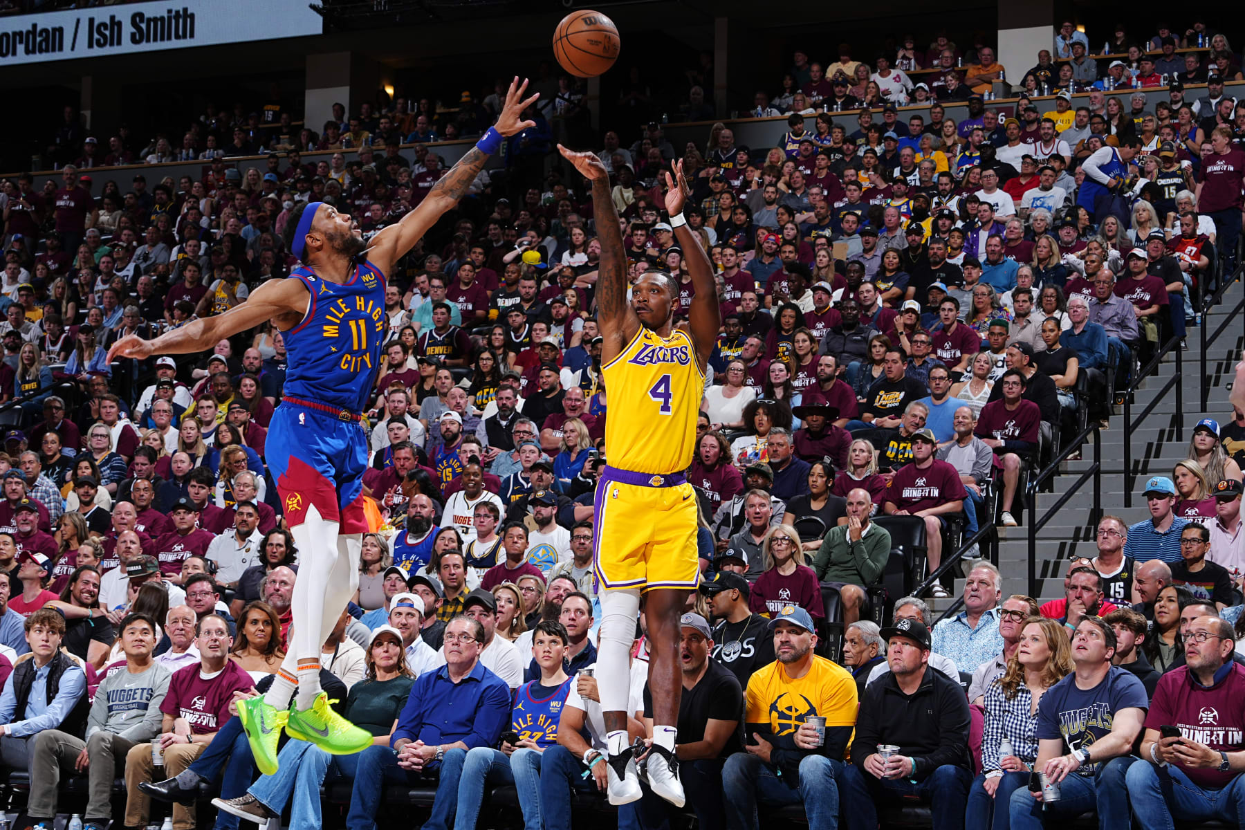 DENVER, CO -  MAY 16: Lonnie Walker IV #4 of the Los Angeles Lakers shoots a three point during Round 3 Game 1 of the Western Conference Finals 2023 NBA Playoffs against the Denver Nuggets on May 16, 2023 at the Ball Arena in Denver, Colorado. NOTE TO USER: User expressly acknowledges and agrees that, by downloading and/or using this Photograph, user is consenting to the terms and conditions of the Getty Images License Agreement. Mandatory Copyright Notice: Copyright 2023 NBAE (Photo by Garrett Ellwood/NBAE via Getty Images)
