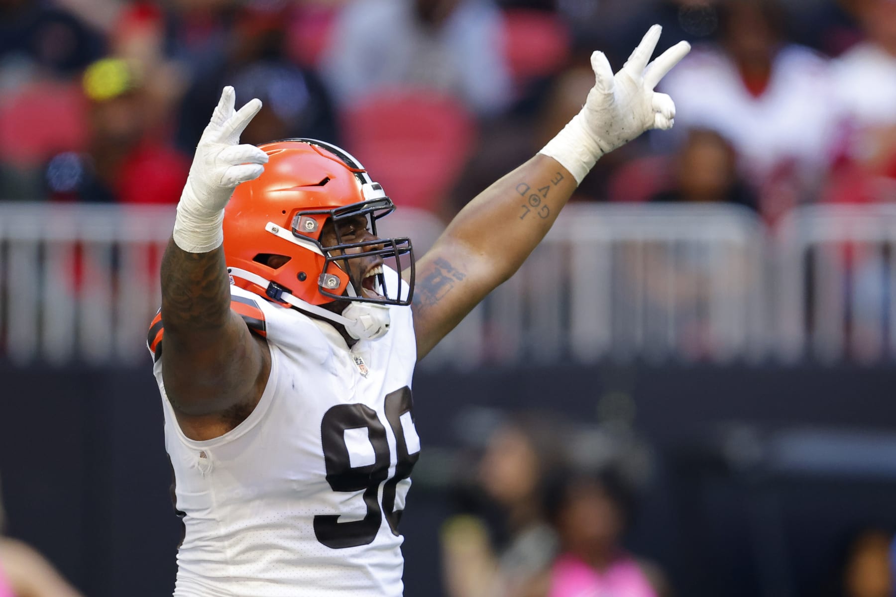 ATLANTA, GEORGIA - OCTOBER 02: Jordan Elliott #96 of the Cleveland Browns reacts after sacking Marcus Mariota #1 of the Atlanta Falcons during the third quarter at Mercedes-Benz Stadium on October 02, 2022 in Atlanta, Georgia. (Photo by Todd Kirkland/Getty Images)