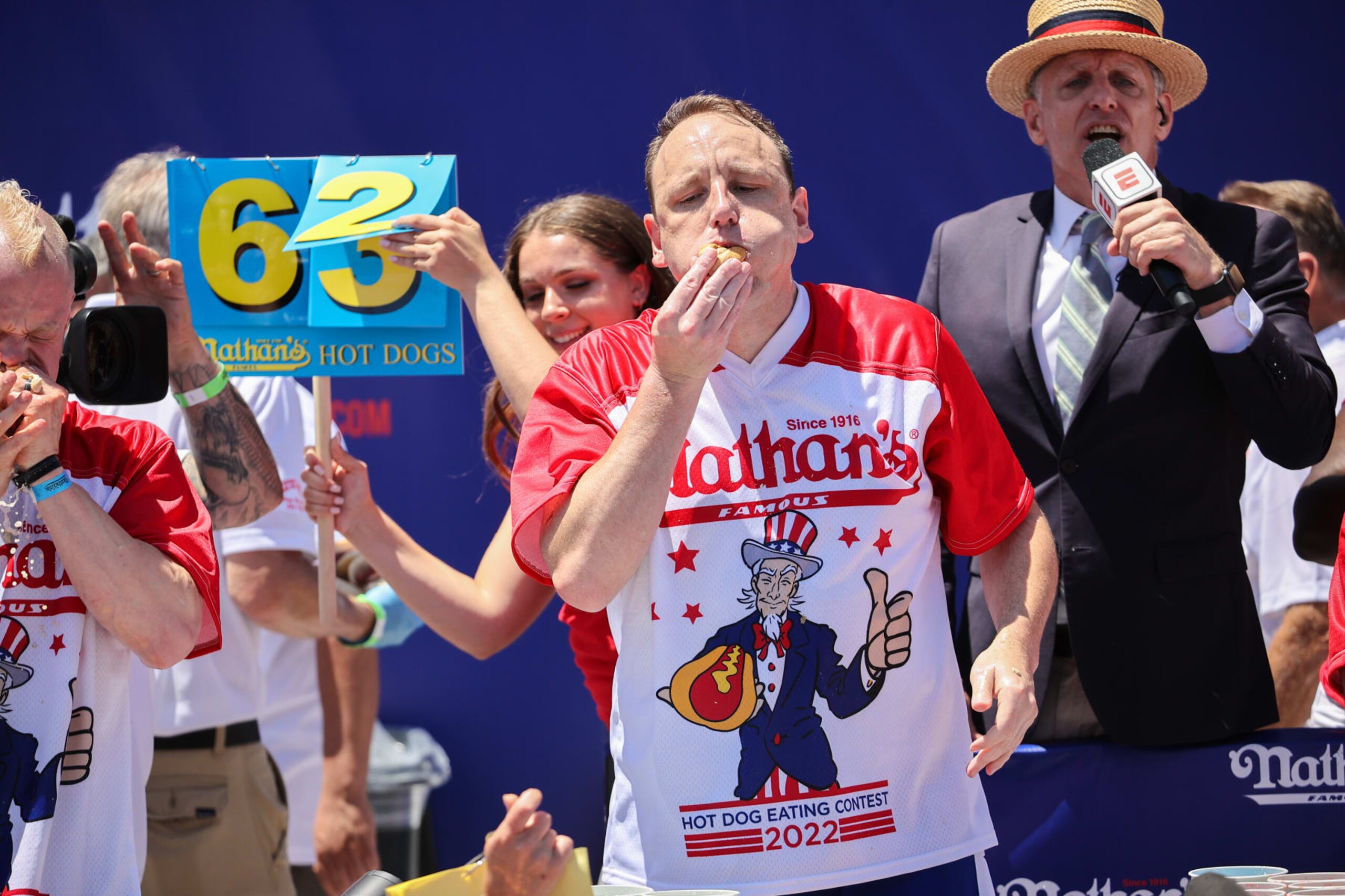 NEW YORK, USA - JULY 04: Joey Chestnut won first place eating 63 hot dogs in 10 minutes during the men 2022 Nathan's Famous International Hot Dog Eating Contest in Coney Island of the Brooklyn borough in New York City, United States on July 4, 2022. (Photo by Tayfun Coskun/Anadolu Agency via Getty Images)