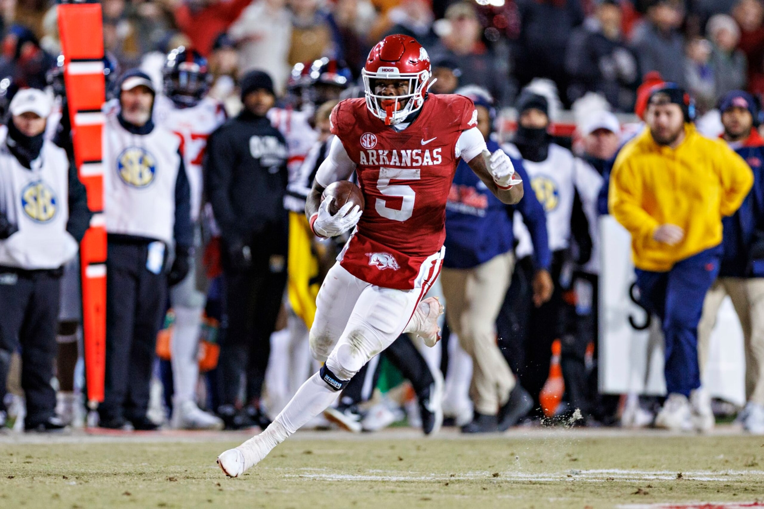 FAYETTEVILLE, ARKANSAS - NOVEMBER 19: Raheim Sanders #5 of the Arkansas Razorbacks runs the ball during a game against the Mississippi Rebels at Donald W. Reynolds Razorback Stadium on November 19, 2022 in Fayetteville, Arkansas. The Razorbacks defeated the Rebels 42-27.  (Photo by Wesley Hitt/Getty Images)