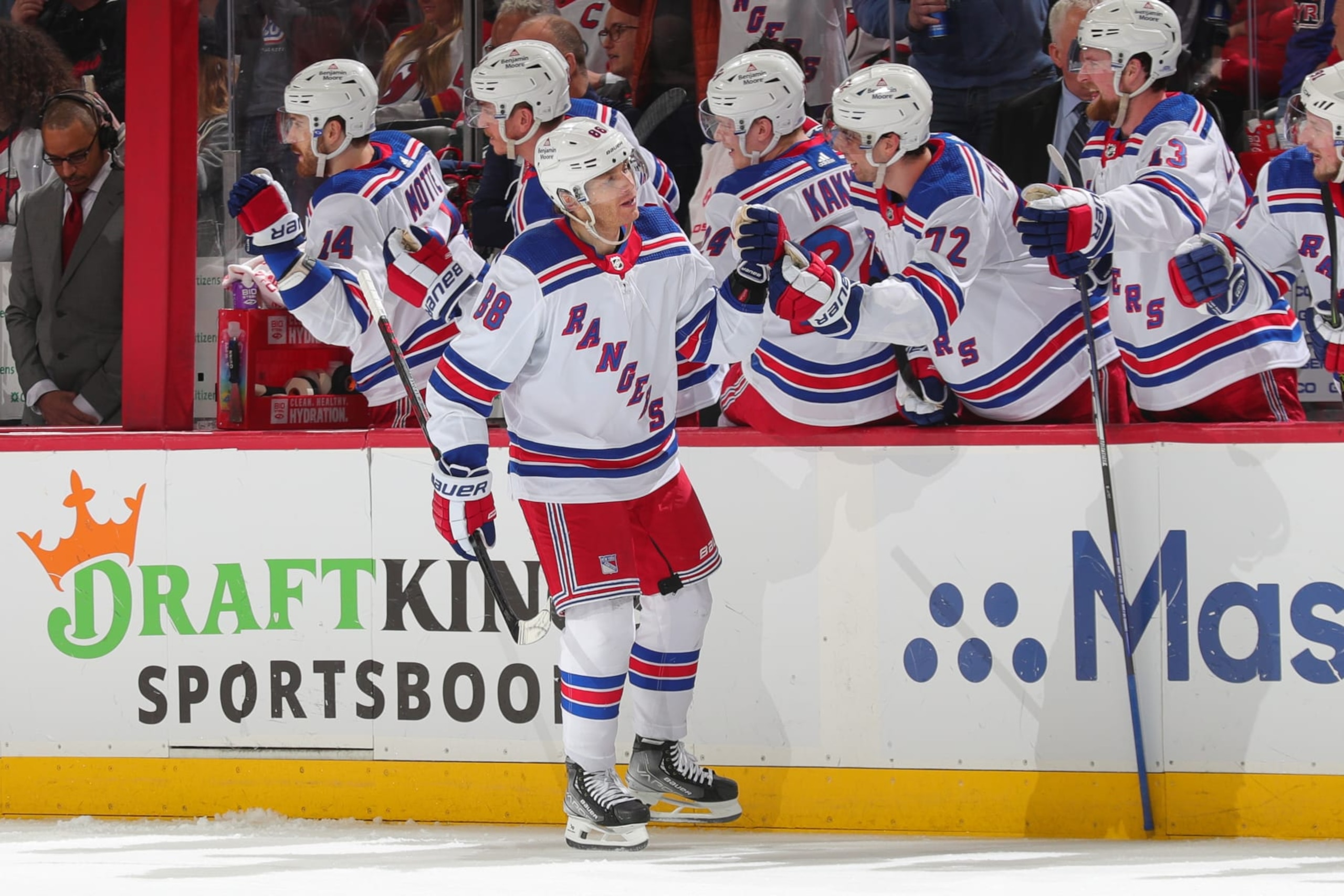 NEWARK, NJ - APRIL 20:  Patrick Kane #88 of the New York Rangers celebrates at the bench after scoring during Game Two of the First Round of the 2023 Stanley Cup Playoffs at the Prudential Center on April 20, 2023 in Newark, New Jersey.  (Photo by Rich Graessle/NHLI via Getty Images)