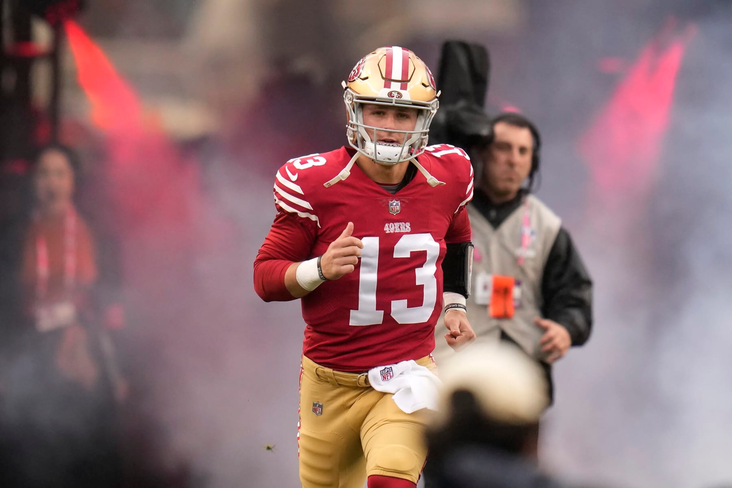 San Francisco 49ers quarterback Brock Purdy (13) is introduced before an NFL wild card playoff football game against the Seattle Seahawks in Santa Clara, Calif., Saturday, Jan. 14, 2023. (AP Photo/Godofredo A. Vásquez)