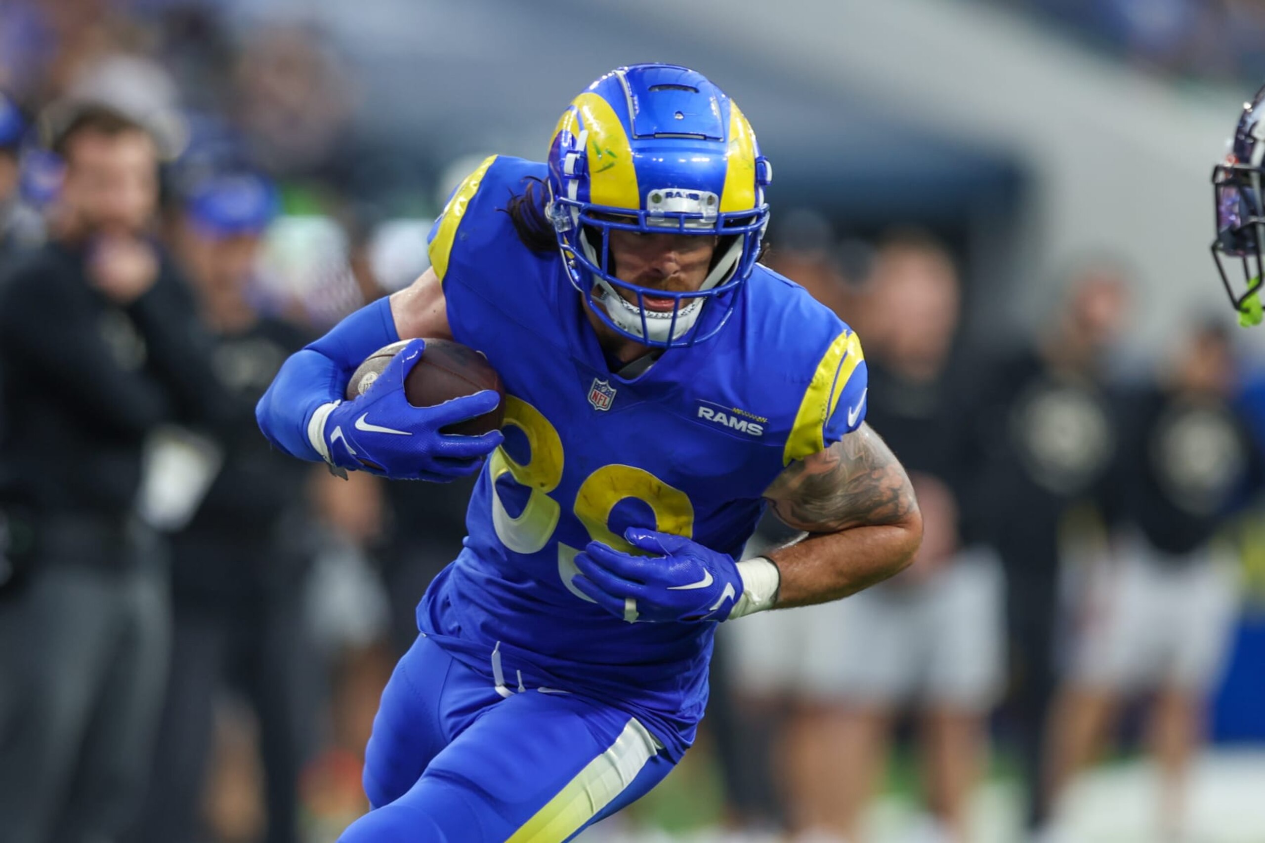 INGLEWOOD, CA - DECEMBER 25: Los Angeles Rams tight end Tyler Higbee (89) catches the ball for a gain during the NFL game between the Denver Broncos and the Los Angeles Rams on December 25, 2022, at SoFi Stadium in Inglewood, CA. (Photo by Jordon Kelly/Icon Sportswire via Getty Images)