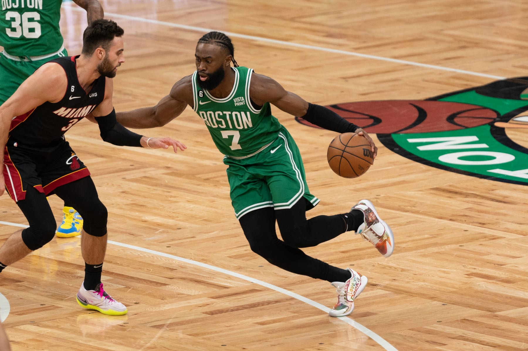 BOSTON, MA - MAY 29: Jaylen Brown #7 of the Boston Celtics dribbles the ball against Max Strus #31 of the Miami Heat during game 7 of the NBA Eastern Conference Finals on May 29, 2023, at TD Garden in Boston, MA. (Photo by Stephen Nadler/PxImages/Icon Sportswire via Getty Images)