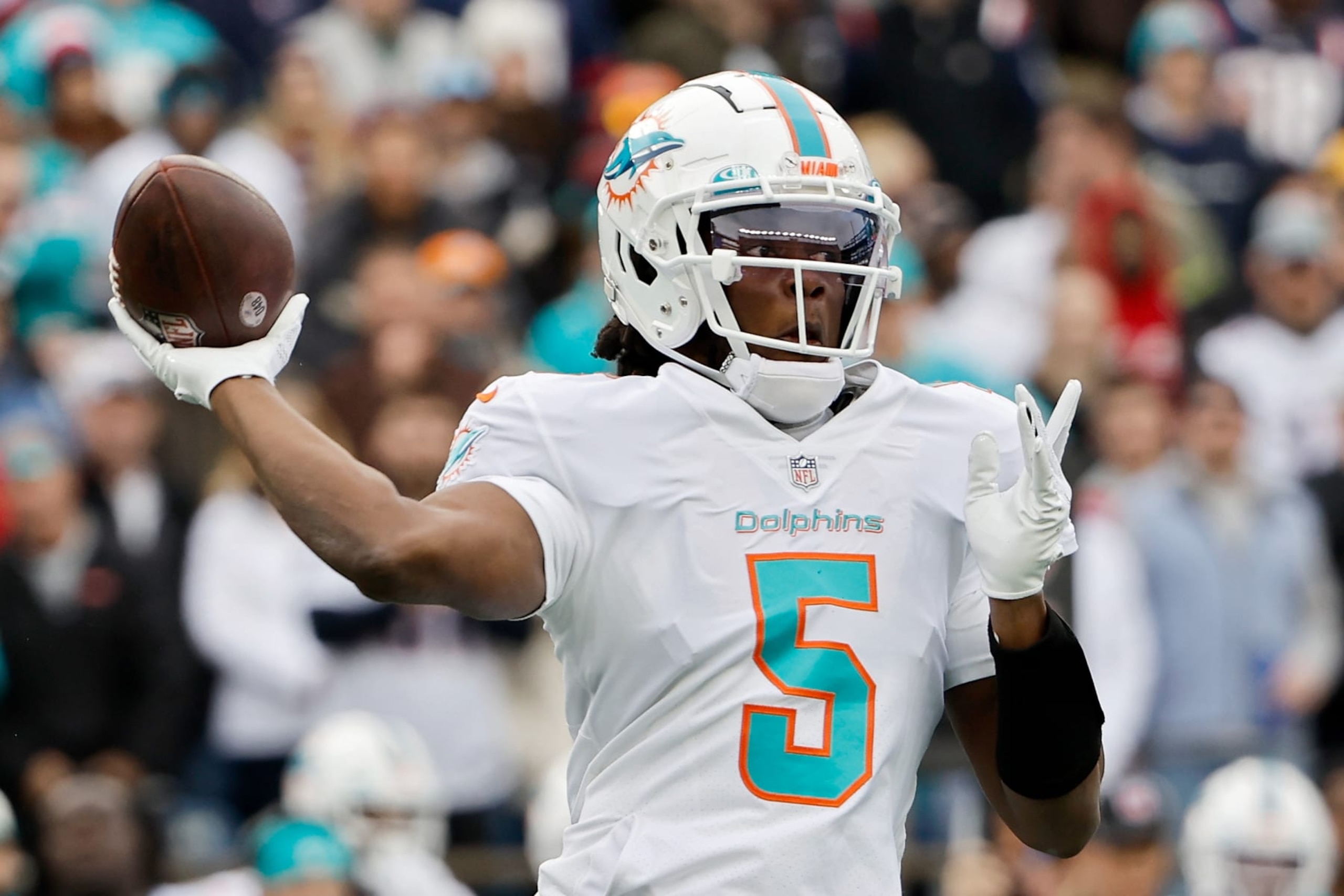FOXBOROUGH, MASSACHUSETTS - JANUARY 01: Teddy Bridgewater #5 of the Miami Dolphins passes against the New England Patriots at Gillette Stadium on January 01, 2023 in Foxborough, Massachusetts. (Photo by Winslow Townson/Getty Images)