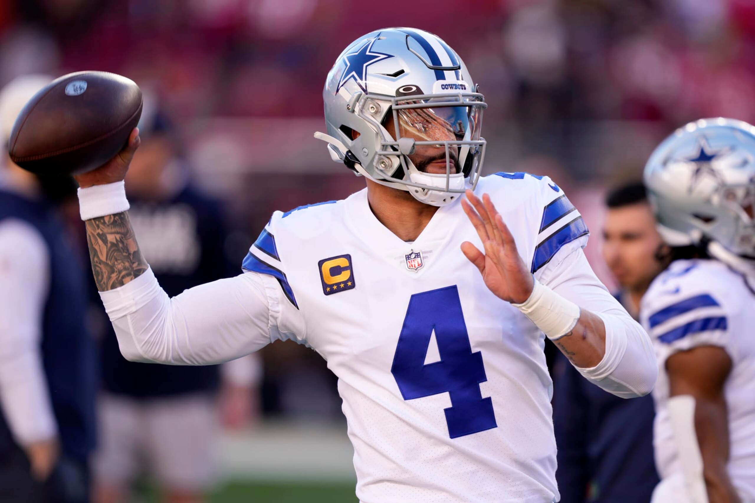 SANTA CLARA, CALIFORNIA - JANUARY 22: Dak Prescott #4 of the Dallas Cowboys warms up prior to a game against the San Francisco 49ers in the NFC Divisional Playoff game at Levi's Stadium on January 22, 2023 in Santa Clara, California. (Photo by Thearon W. Henderson/Getty Images) SANTA CLARA, CALIFORNIA - JANUARY 22: Dak Prescott #4 of the Dallas Cowboys warms up prior to a game against the San Francisco 49ers in the NFC Divisional Playoff game at Levi's Stadium on January 22, 2023 in Santa Clara, California. (Photo by Thearon W. Henderson/Getty Images)