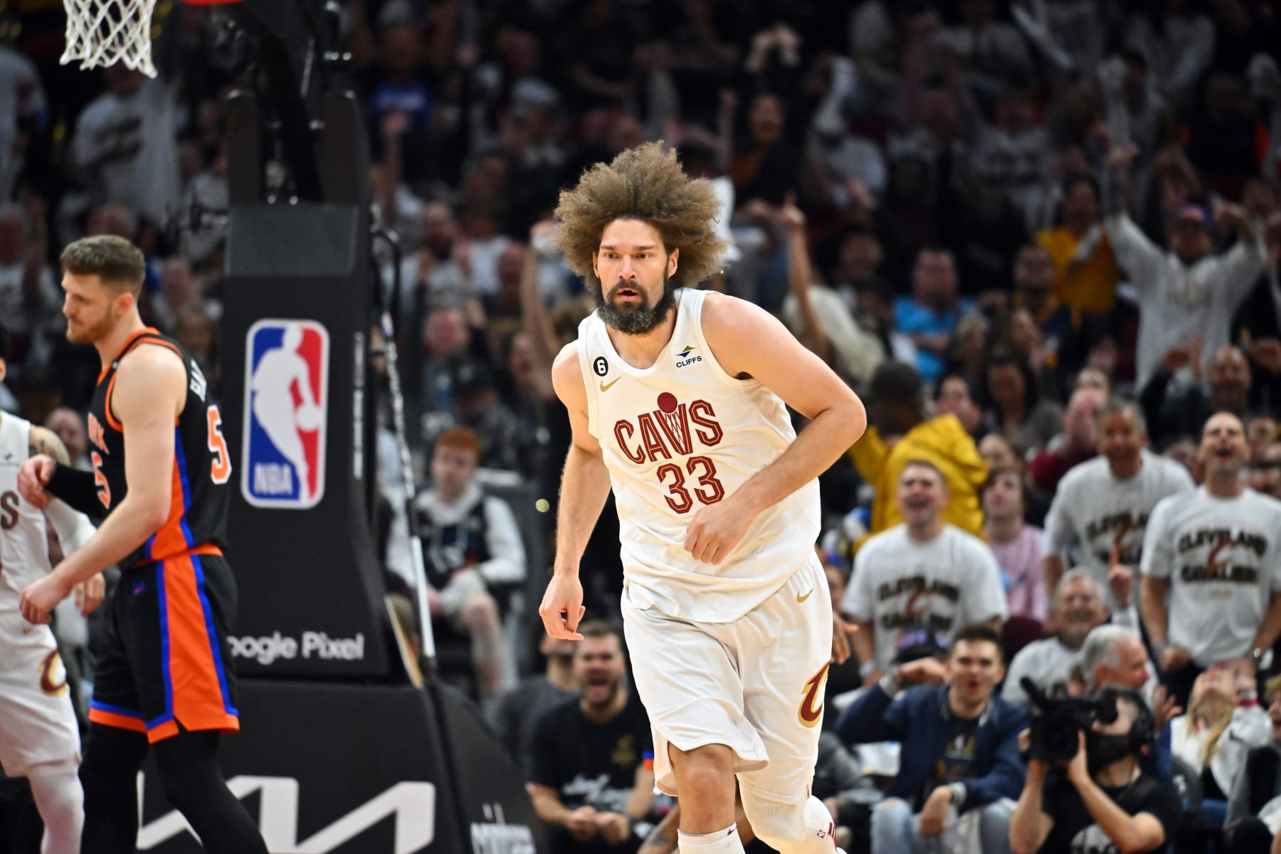 CLEVELAND, OHIO - APRIL 18: Robin Lopez #33 of the Cleveland Cavaliers runs back on defense after scoring during the fourth quarter of Game Two of the Eastern Conference First Round Playoffs against the New York Knicks at Rocket Mortgage Fieldhouse on April 18, 2023 in Cleveland, Ohio. The Cavaliers defeated the Knicks 107-90. NOTE TO USER: User expressly acknowledges and agrees that, by downloading and or using this photograph, User is consenting to the terms and conditions of the Getty Images License Agreement. (Photo by Jason Miller/Getty Images)