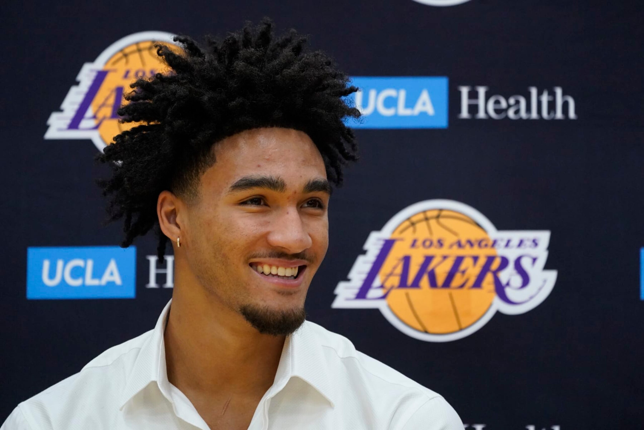 Los Angeles Lakers draft pick Jalen Hood-Schifino speaks during the NBA basketball team's news conference in El Segundo, Calif., on Tuesday, June 27, 2023. (AP Photo/Damian Dovarganes)