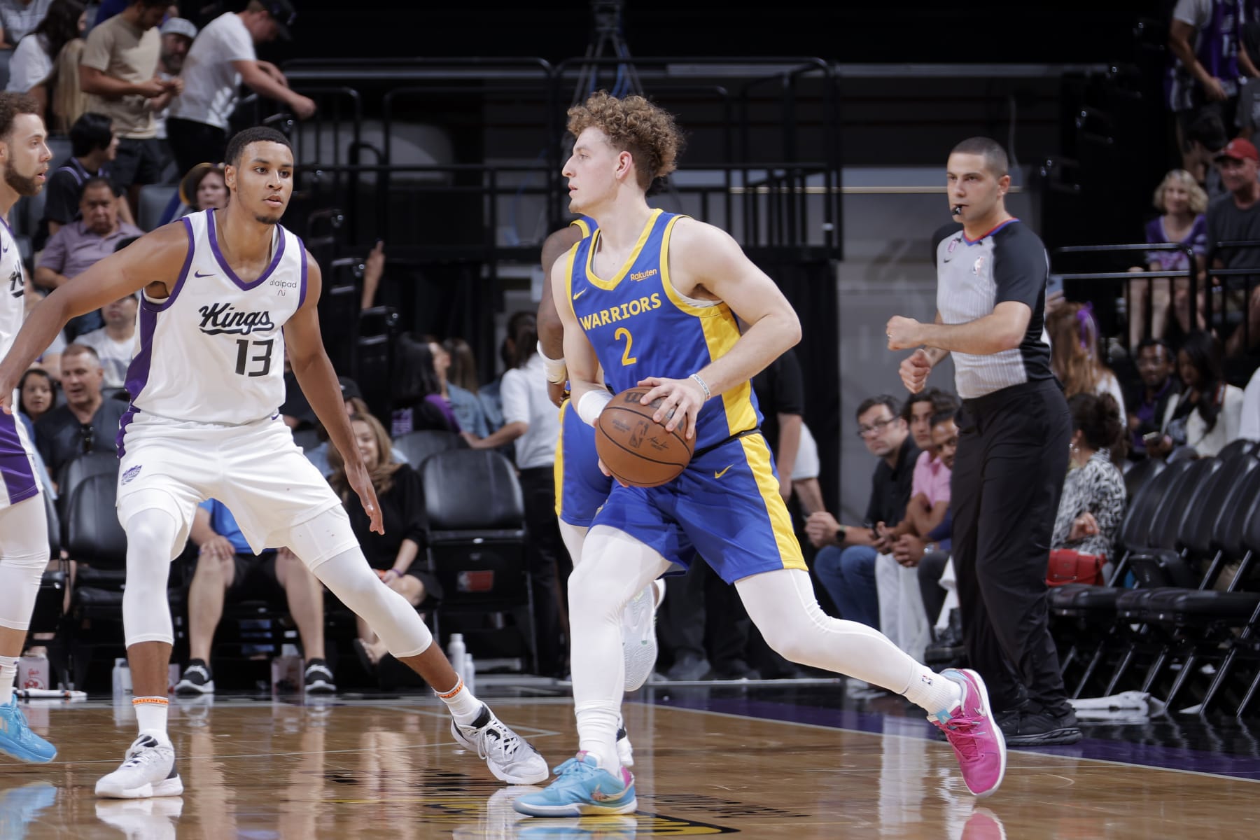 SACRAMENTO, CA - JULY 3: Brandin Podziemski #2 of the Golden State Warriors dribbles the ball during the game against the Sacramento Kings during the 2023 NBA California Classic on July 3, 2023 at Golden 1 Center in Sacramento, California. NOTE TO USER: User expressly acknowledges and agrees that, by downloading and or using this Photograph, user is consenting to the terms and conditions of the Getty Images License Agreement. Mandatory Copyright Notice: Copyright 2023 NBAE (Photo by Rocky Widner/NBAE via Getty Images)