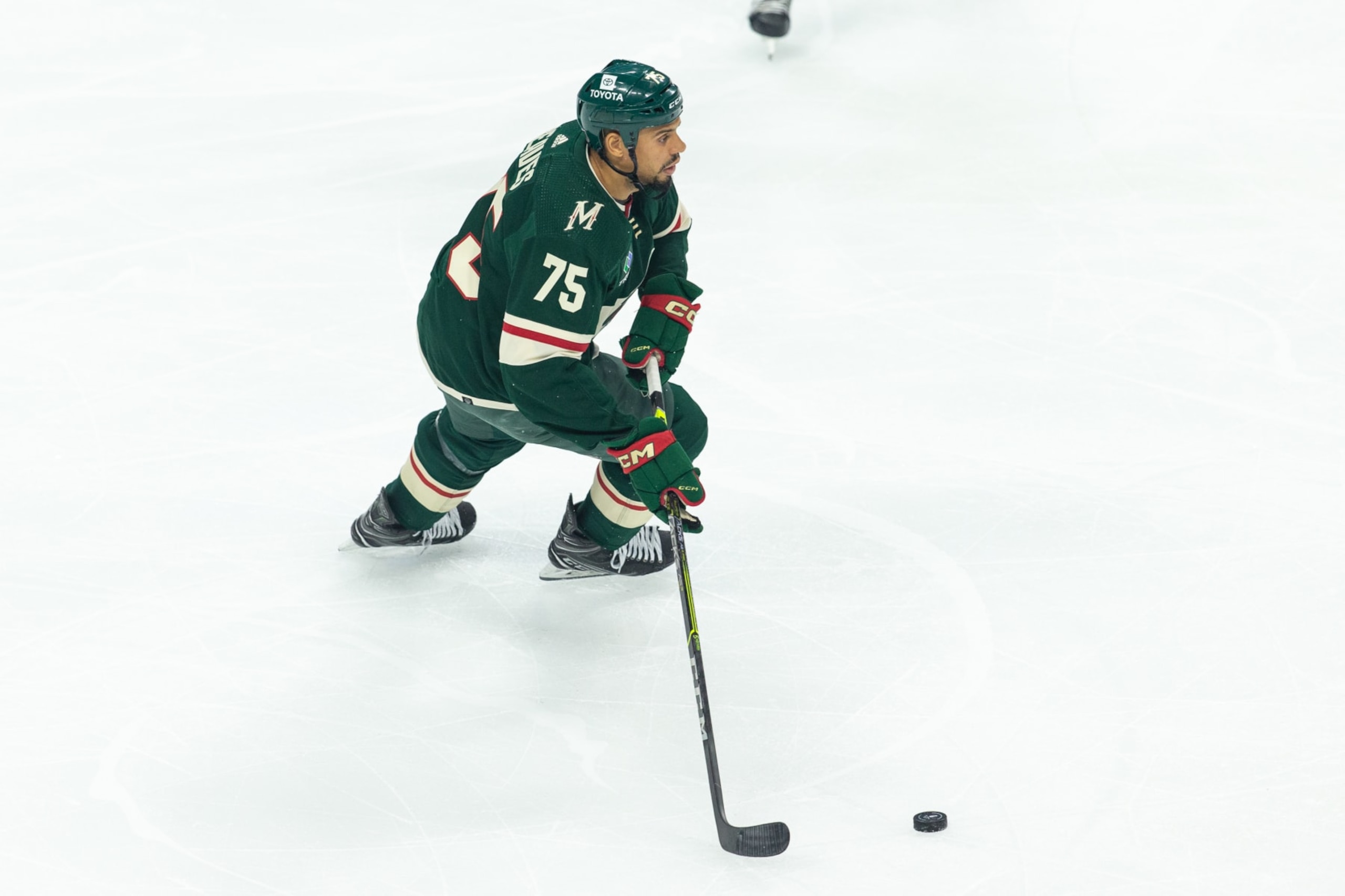 SAINT PAUL, MN - APRIL 21: Minnesota Wild right wing Ryan Reaves (75) skates with the puck during the NHL game between the Minnesota Wild and the Dallas Stars, on April 21st, 2023, at the Xcel Energy Center in Saint Paul, MN. (Photo by Bailey Hillesheim/Icon Sportswire via Getty Images)