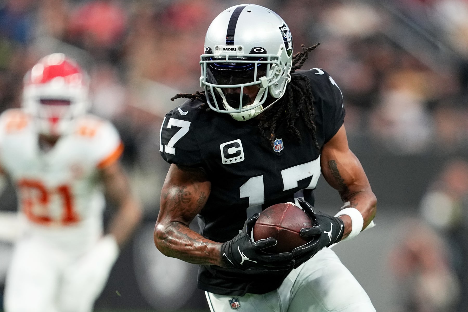 LAS VEGAS, NEVADA - JANUARY 07: Davante Adams #17 of the Las Vegas Raiders carries the ball against the Kansas City Chiefs during the first half of the game at Allegiant Stadium on January 07, 2023 in Las Vegas, Nevada. (Photo by Chris Unger/Getty Images)