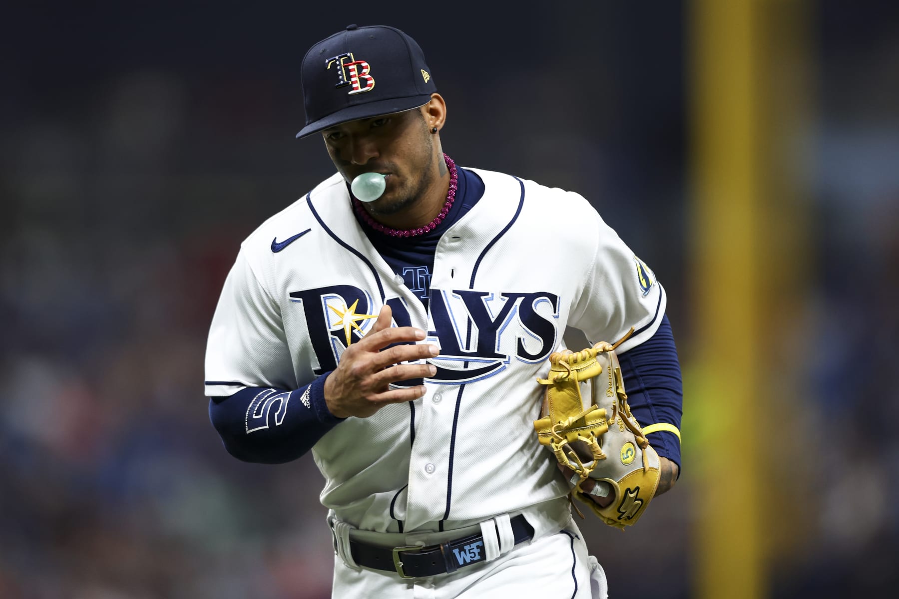 ST PETERSBURG, FL - JULY 4: Wander Franco #5 of the Tampa Bay Rays jogs back to the dugout after the top of the fourth inning against the Philadelphia Phillies at Tropicana Field on July 4, 2023 in St Petersburg, Florida. (Photo by Kevin Sabitus/Getty Images)