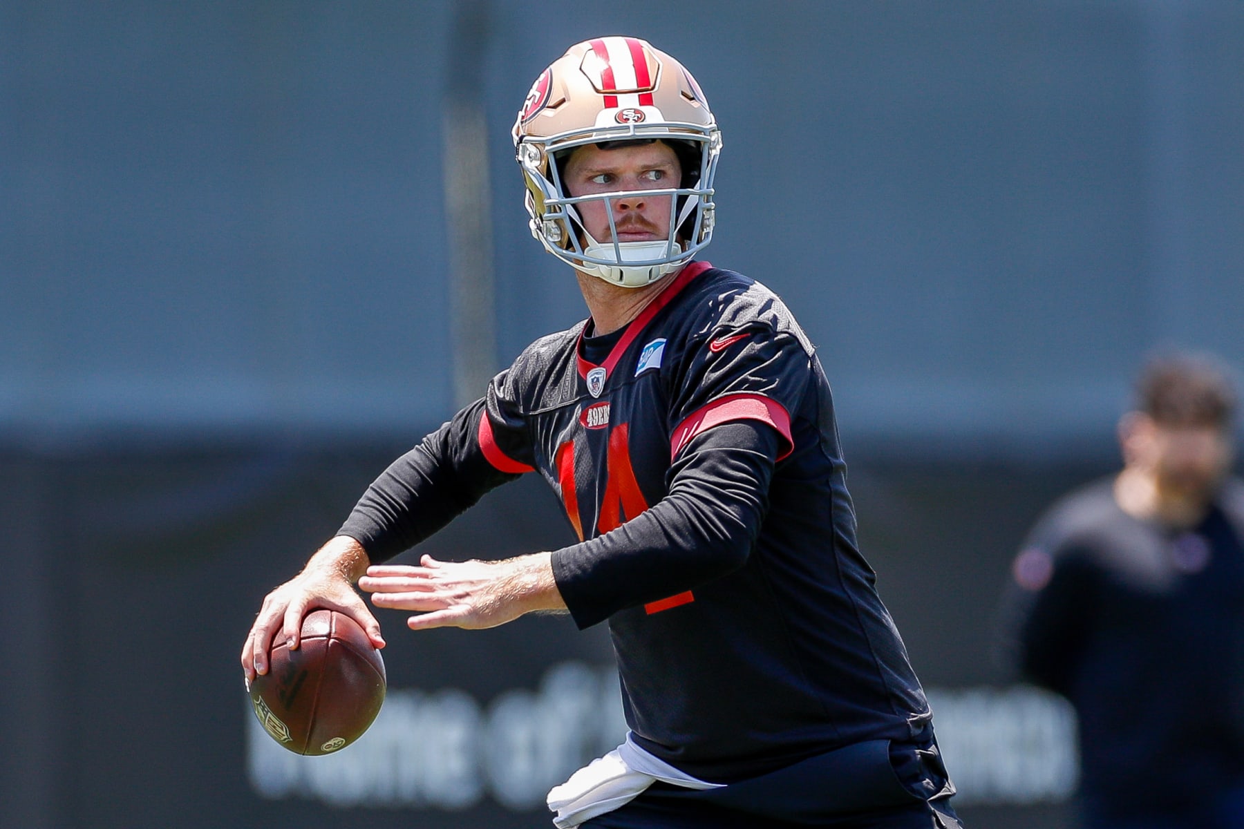 SANTA CLARA, CA - MAY 31: San Francisco 49ers quarterback Sam Darnold (14) takes part in a drill during the team's OTA practice on May 31, 2023, at the SAP Performance Facility in Santa Clara, CA. (Photo by Brandon Sloter/Icon Sportswire via Getty Images)