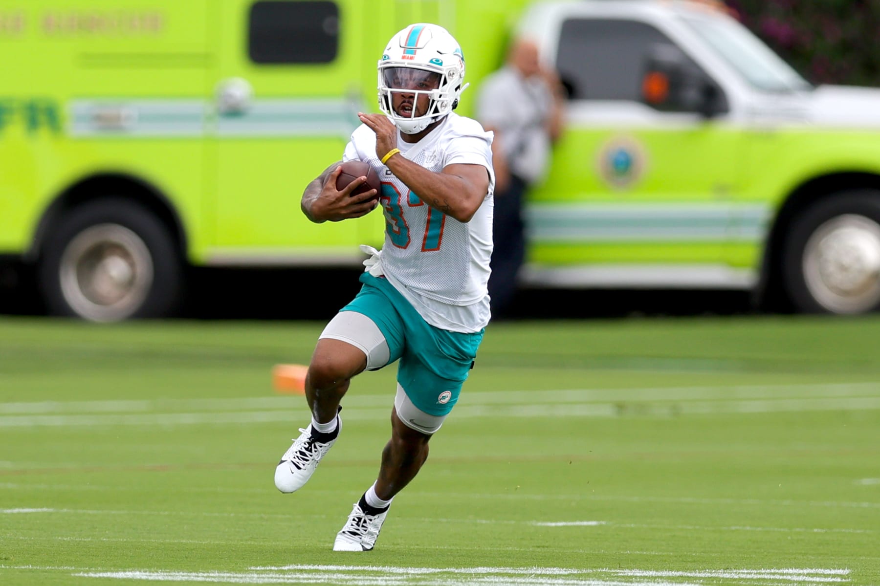 MIAMI GARDENS, FLORIDA - MAY 31: Myles Gaskin #37 of the Miami Dolphins takes part in a drill during practice at Baptist Health Training Complex on May 31, 2023 in Miami Gardens, Florida. (Photo by Megan Briggs/Getty Images)