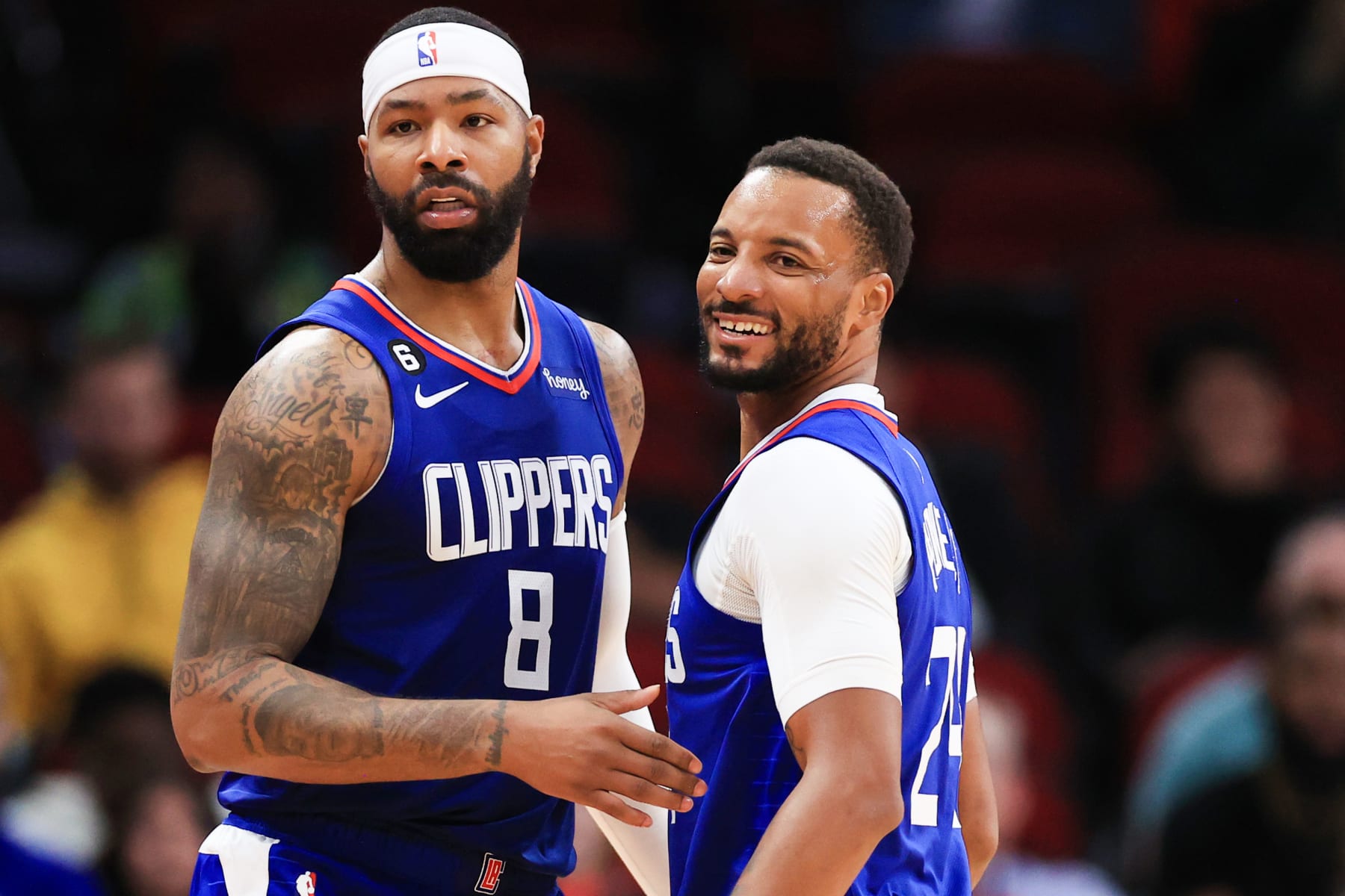 HOUSTON, TEXAS - NOVEMBER 02: Marcus Morris Sr. #8 and Norman Powell #24 of the LA Clippers react during the second half against the Houston Rockets at Toyota Center on November 02, 2022 in Houston, Texas. NOTE TO USER: User expressly acknowledges and agrees that, by downloading and or using this photograph, User is consenting to the terms and conditions of the Getty Images License Agreement. (Photo by Carmen Mandato/Getty Images)