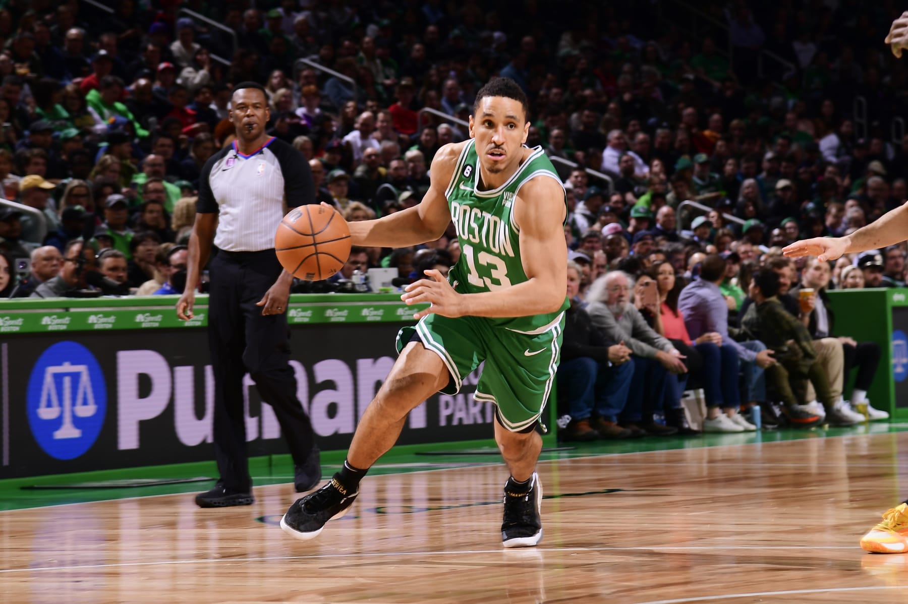 BOSTON, MA - APRIL 5: Malcolm Brogdon #13 of the Boston Celtics drives to the basket during the game against the Toronto Raptors on April 5, 2023 at the TD Garden in Boston, Massachusetts. NOTE TO USER: User expressly acknowledges and agrees that, by downloading and or using this photograph, User is consenting to the terms and conditions of the Getty Images License Agreement. Mandatory Copyright Notice: Copyright 2023 NBAE  (Photo by Brian Babineau/NBAE via Getty Images)