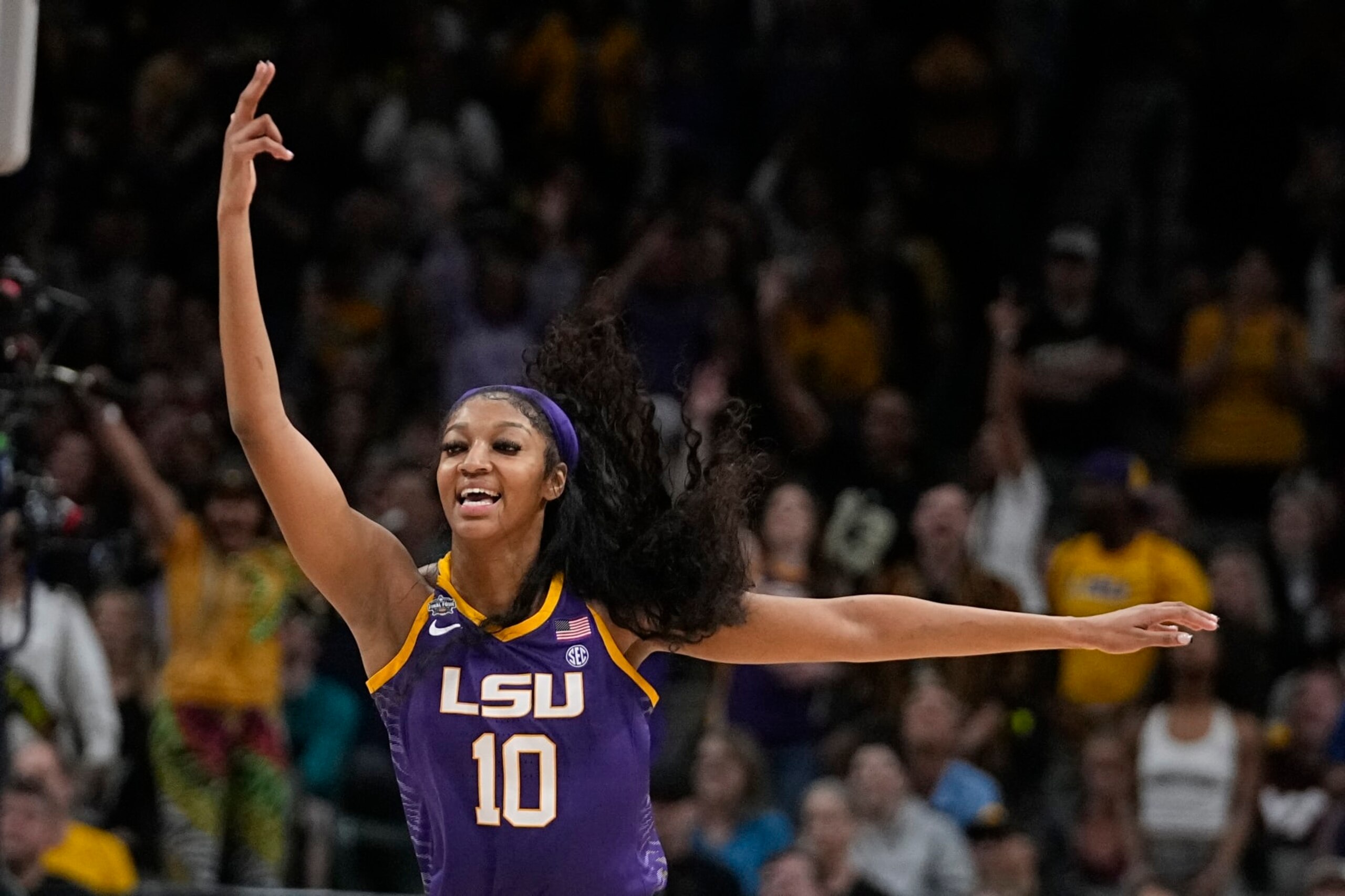 LSU's Angel Reese celebrates during the second half of the NCAA Women's Final Four championship basketball game against Iowa Sunday, April 2, 2023, in Dallas. (AP Photo/Darron Cummings) LSU's Angel Reese celebrates during the second half of the NCAA Women's Final Four championship basketball game against Iowa Sunday, April 2, 2023, in Dallas. (AP Photo/Darron Cummings)