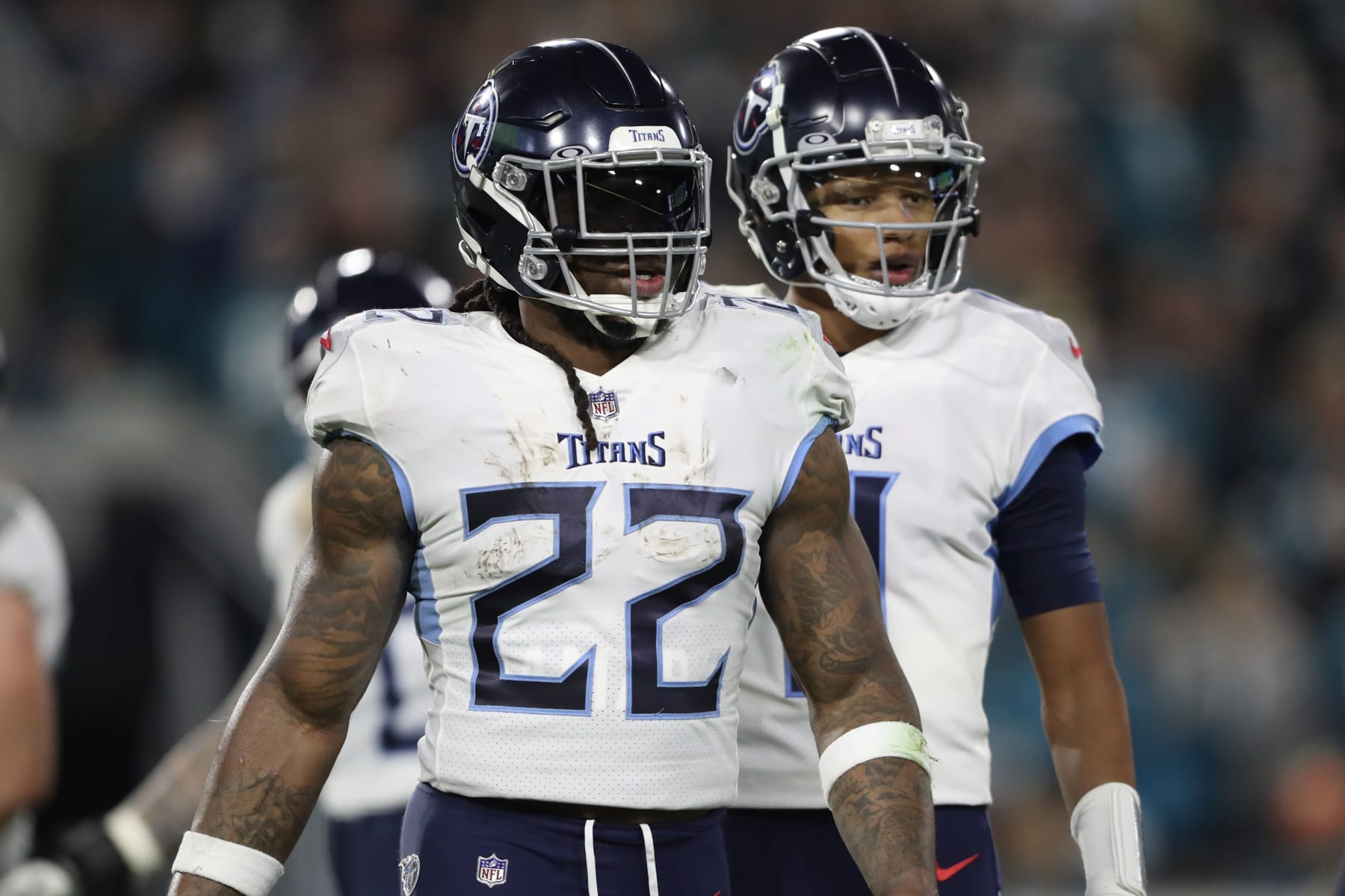 JACKSONVILLE, FLORIDA - JANUARY 07: Derrick Henry #22 and Joshua Dobbs #11 of the Tennessee Titans in action during the first half against the Jacksonville Jaguars at TIAA Bank Field on January 07, 2023 in Jacksonville, Florida. (Photo by Courtney Culbreath/Getty Images)