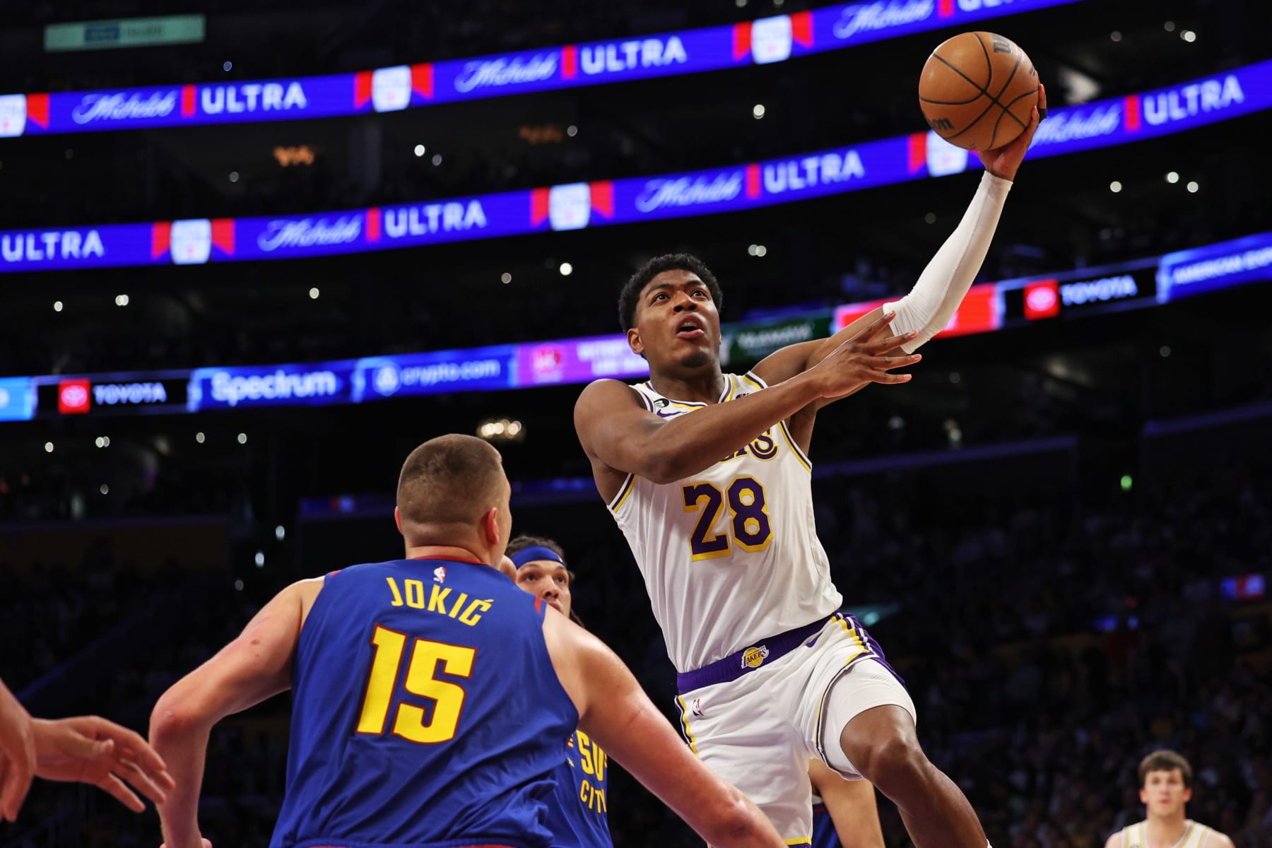 LOS ANGELES, CALIFORNIA - MAY 20: Rui Hachimura #28 of the Los Angeles Lakers shoots the ball against Nikola Jokic #15 of the Denver Nuggets during the first quarter in game three of the Western Conference Finals at Crypto.com Arena on May 20, 2023 in Los Angeles, California. NOTE TO USER: User expressly acknowledges and agrees that, by downloading and or using this photograph, User is consenting to the terms and conditions of the Getty Images License Agreement. (Photo by Harry How/Getty Images)