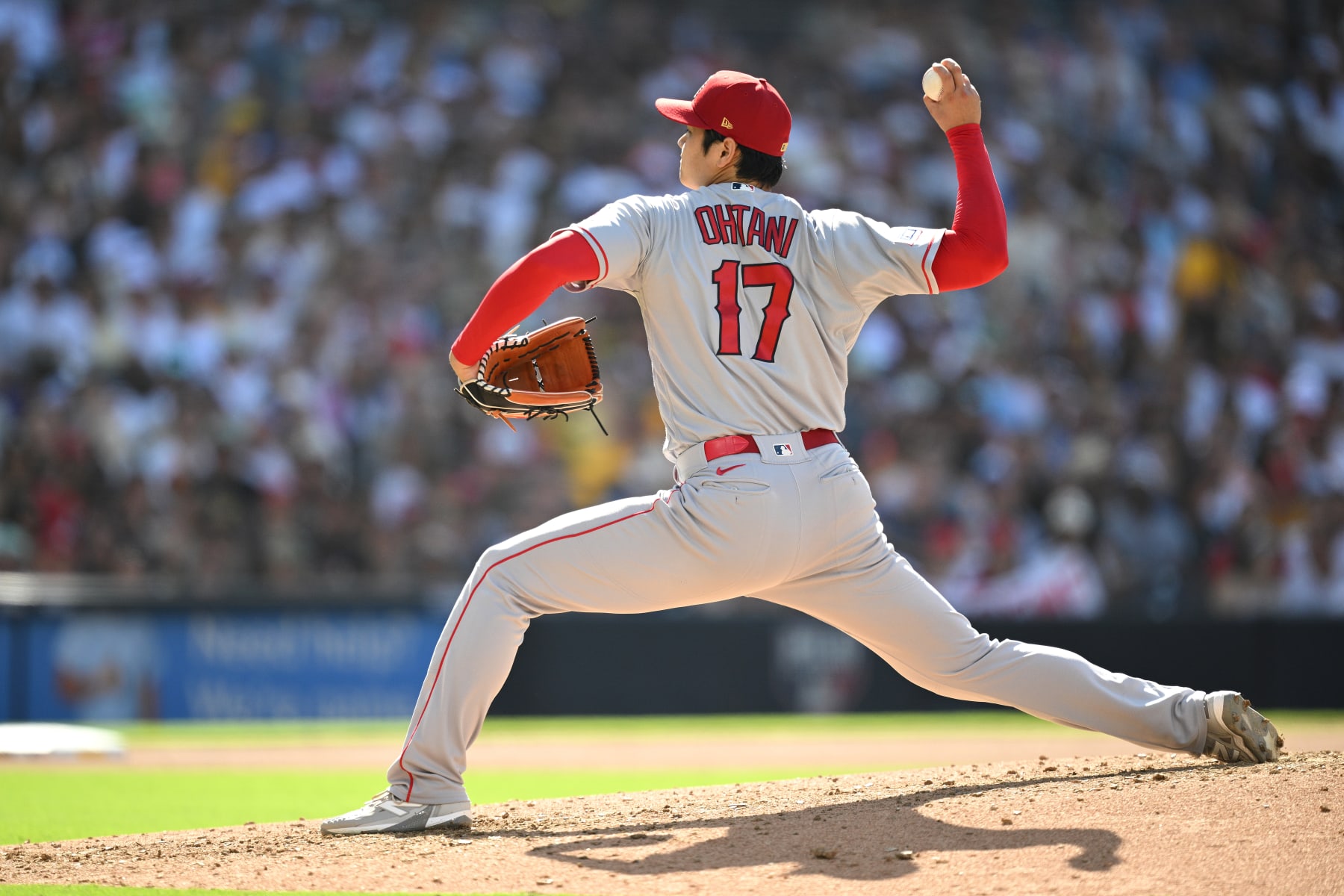 SAN DIEGO, CALIFORNIA - JULY 04: Shohei Ohtani #17 of the Los Angeles Angels throws a pitch against the San Diego Padres during the fourth inning at PETCO Park on July 04, 2023 in San Diego, California. (Photo by Orlando Ramirez/Getty Images)