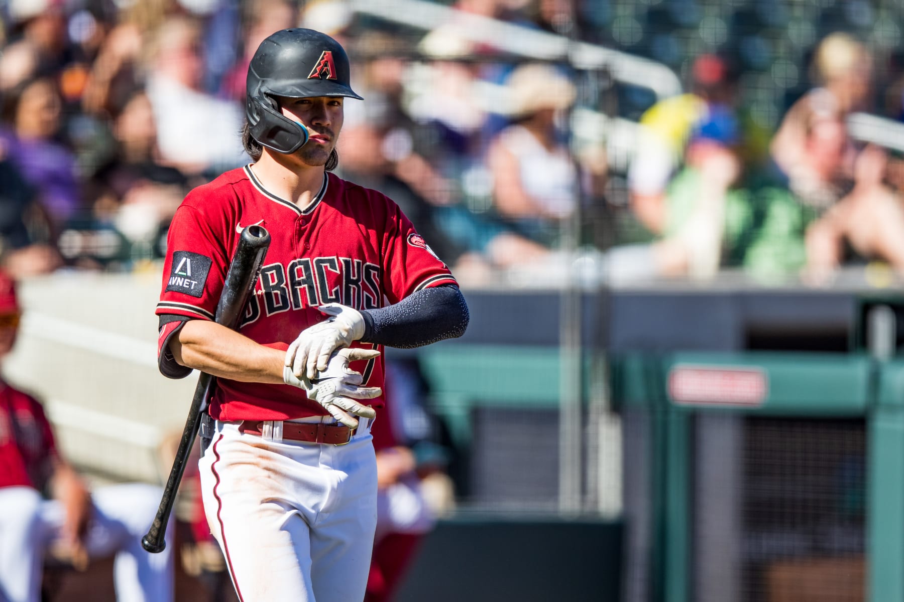SCOTTSDALE, ARIZONA - MARCH 12: Corbin Carrol #7 of the Arizona Diamondbacks walks to home plate during the Spring Training game against the Colorado Rockies at Salt River Fields at Talking Stick on March 12, 2023 in Scottsdale, Arizona. (Photo by John E. Moore III/Getty Images)