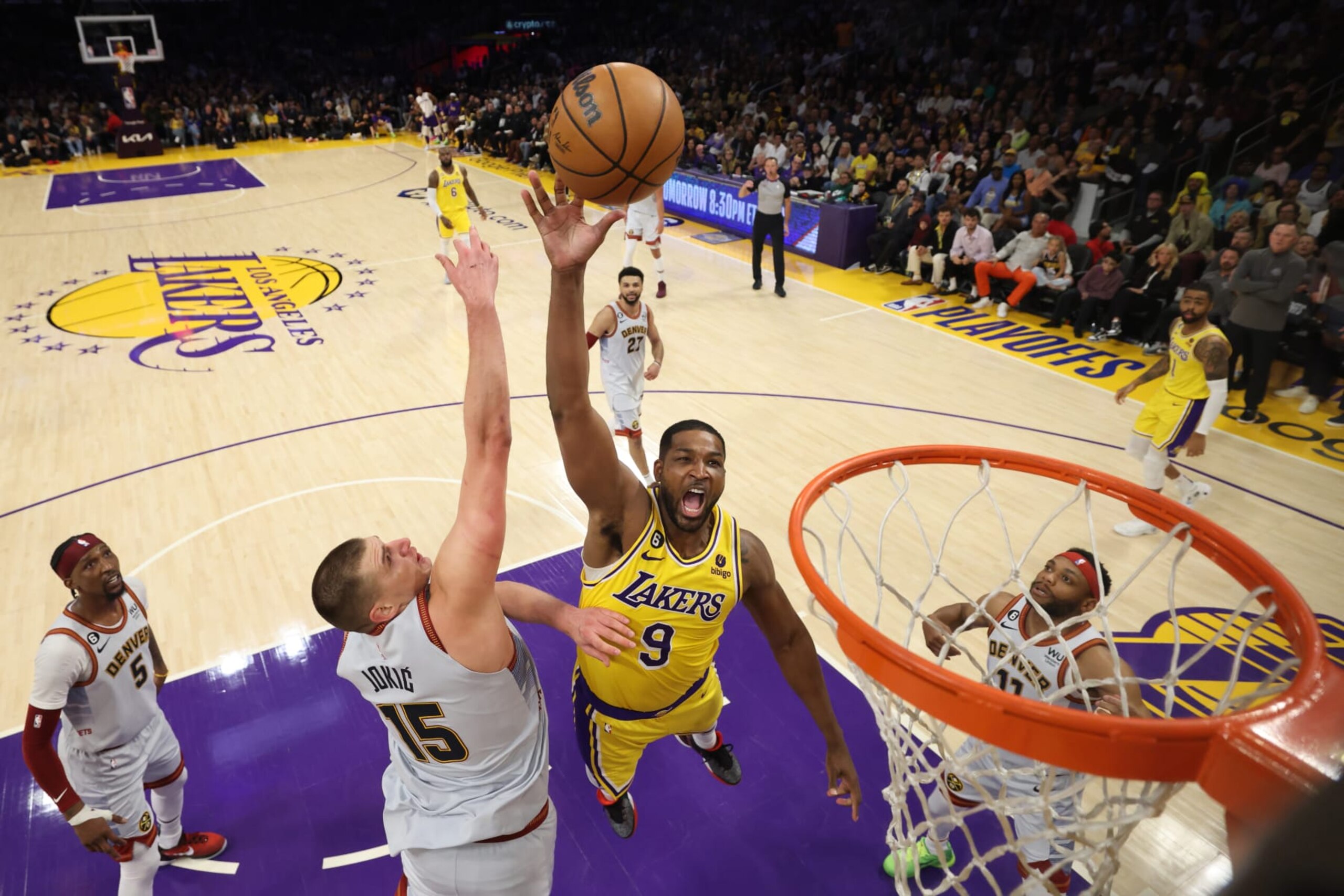 LOS ANGELES, CALIFORNIA - MAY 22: Tristan Thompson #9 of the Los Angeles Lakers shoots the ball past Nikola Jokic #15 of the Denver Nuggets during the second half in game four of the Western Conference Finals at Crypto.com Arena on May 22, 2023 in Los Angeles, California. NOTE TO USER: User expressly acknowledges and agrees that, by downloading and or using this photograph, User is consenting to the terms and conditions of the Getty Images License Agreement. (Photo by Harry How/Getty Images)