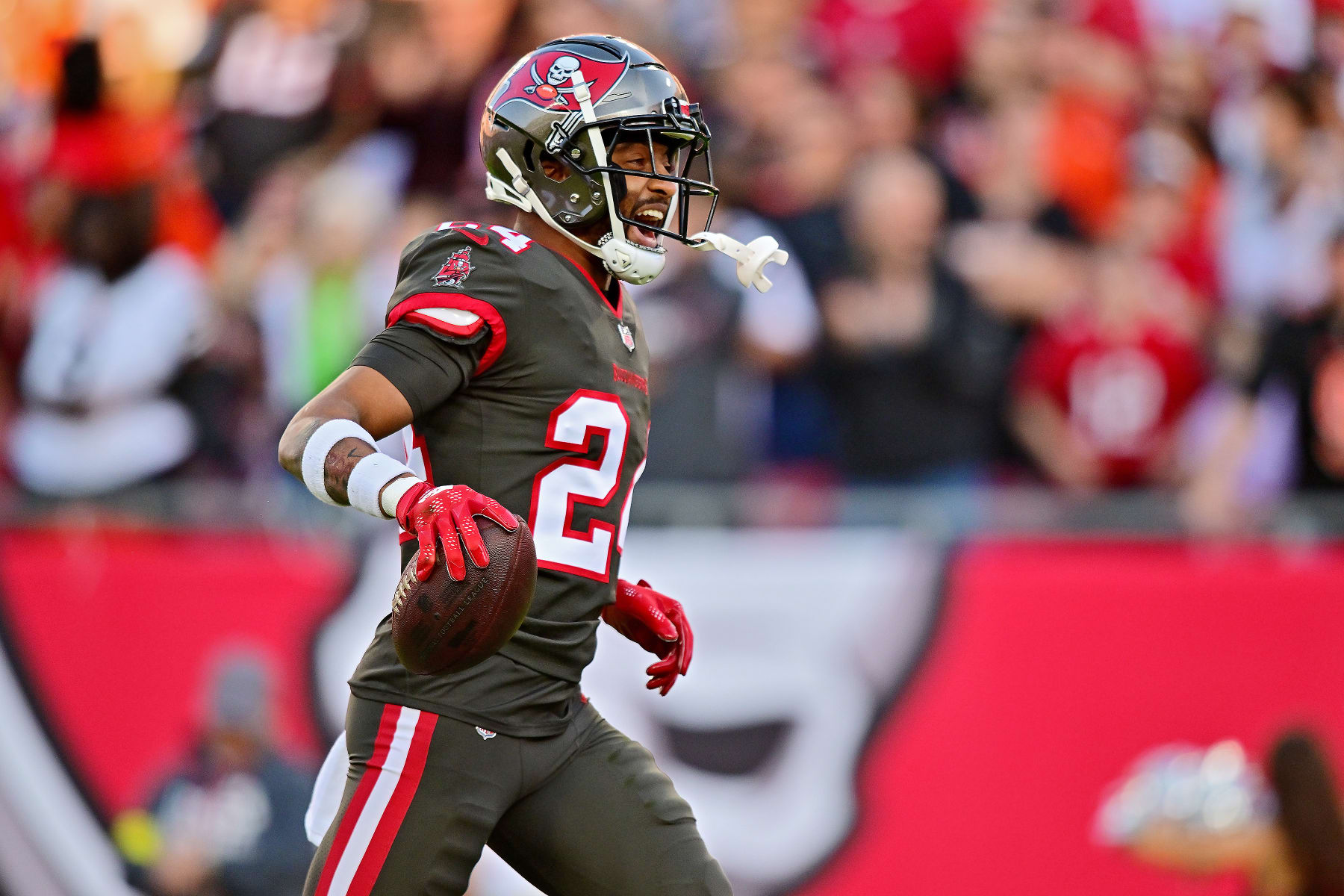 TAMPA, FLORIDA - DECEMBER 18: Carlton Davis III #24 of the Tampa Bay Buccaneers celebrates after an interception during the first quarter in the game against the Cincinnati Bengals at Raymond James Stadium on December 18, 2022 in Tampa, Florida. (Photo by Julio Aguilar/Getty Images)