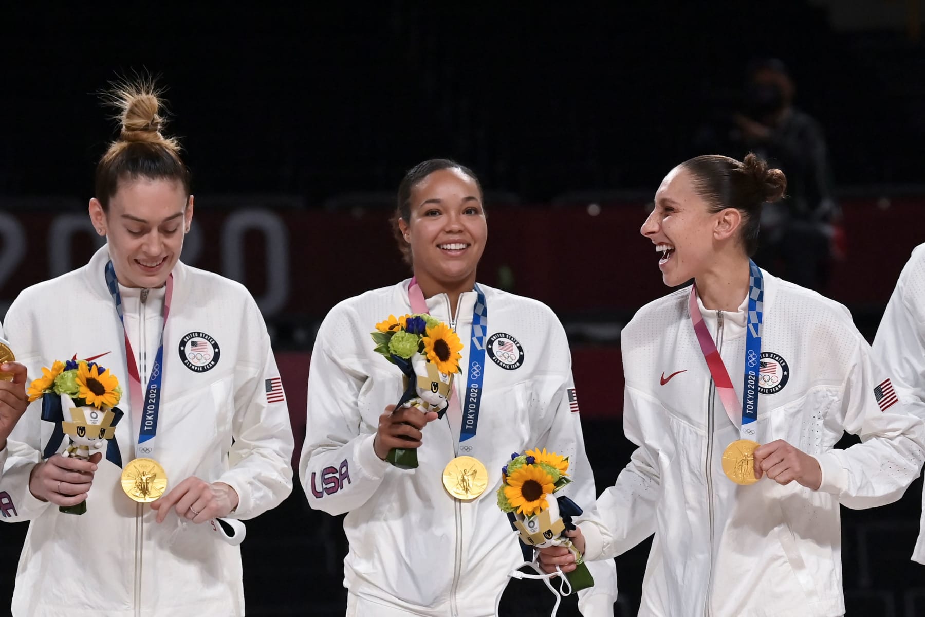 (From L) First placed USA's Breanna Stewart, USA's Napheesa Collier, USA's Diana Taurasi, USA's Chelsea Graythe medal ceremonyin the women's final basketball match between USA and Japan during the Tokyo 2020 Olympic Games at the Saitama Super Arena in Saitama on August 8, 2021. (Photo by Aris MESSINIS / AFP) (Photo by ARIS MESSINIS/AFP via Getty Images) (From L) First placed USA's Breanna Stewart, USA's Napheesa Collier, USA's Diana Taurasi, USA's Chelsea Graythe medal ceremonyin the women's final basketball match between USA and Japan during the Tokyo 2020 Olympic Games at the Saitama Super Arena in Saitama on August 8, 2021. (Photo by Aris MESSINIS / AFP) (Photo by ARIS MESSINIS/AFP via Getty Images)