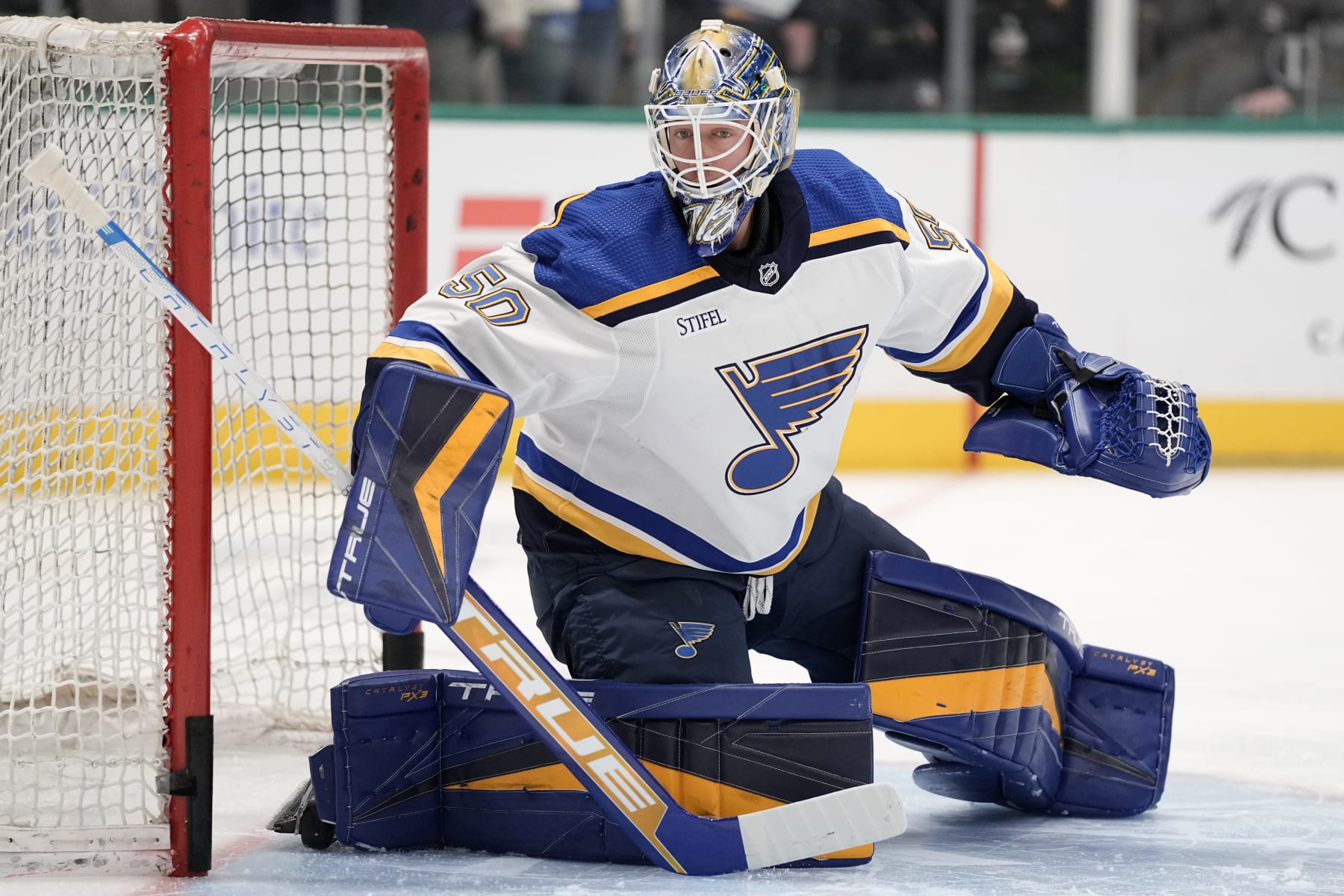 DALLAS, TEXAS - APRIL 13: Jordan Binnington #50 of the St. Louis Blues warms up before the game against the Dallas Stars at American Airlines Center on April 13, 2023 in Dallas, Texas. (Photo by Sam Hodde/NHLI via Getty Images)
