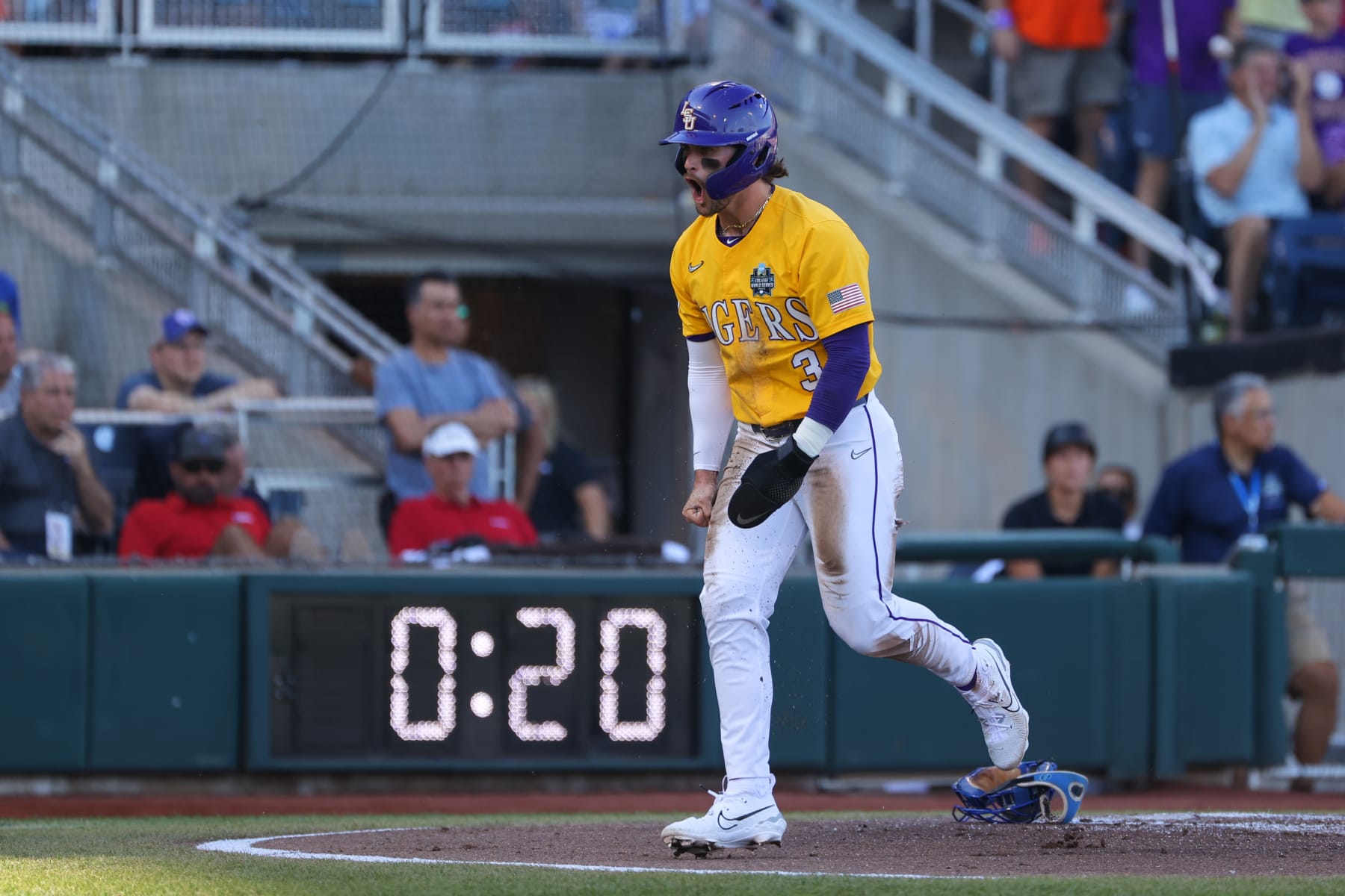 OMAHA, NE - JUNE 24: Dylan Crews #3 of the LSU Tigers scores a run against the Florida Gators in the first inning during game one of the Division I Men's Baseball Championship held at Charles Schwab Field on June 24, 2023 in Omaha, Nebraska. (Photo by C. Morgan Engel/NCAA Photos via Getty Images)