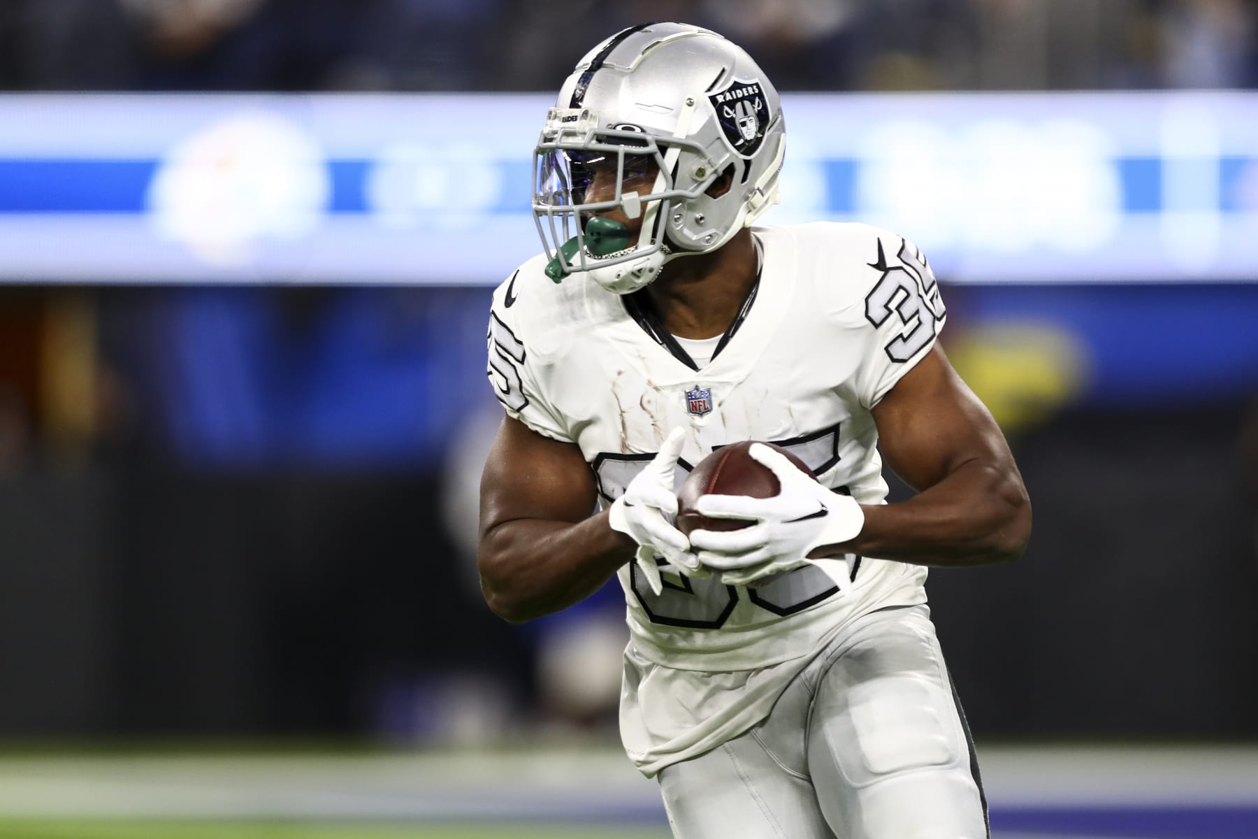 INGLEWOOD, CA - DECEMBER 8: Zamir White #35 of the Las Vegas Raiders carries the ball during an NFL football game against the Los Angeles Rams at SoFi Stadium on December 8, 2022 in Inglewood, California. (Photo by Kevin Sabitus/Getty Images)