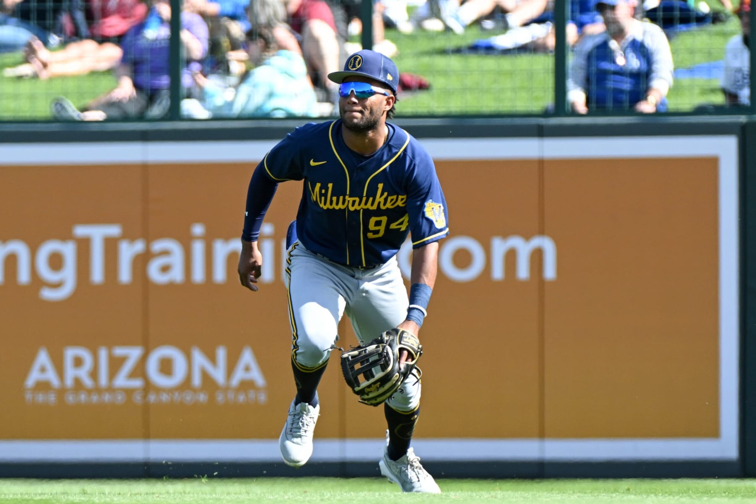 GLENDALE, ARIZONA - MARCH 24, 2023: Jackson Chourio #94 of the Milwaukee Brewers fields a fly ball during the seventh inning of a spring training game against the Los Angeles Dodgers at Camelback Ranch on March 24, 2023 in Glendale, Arizona. (Photo by David Durochik/Diamond Images via Getty Images)