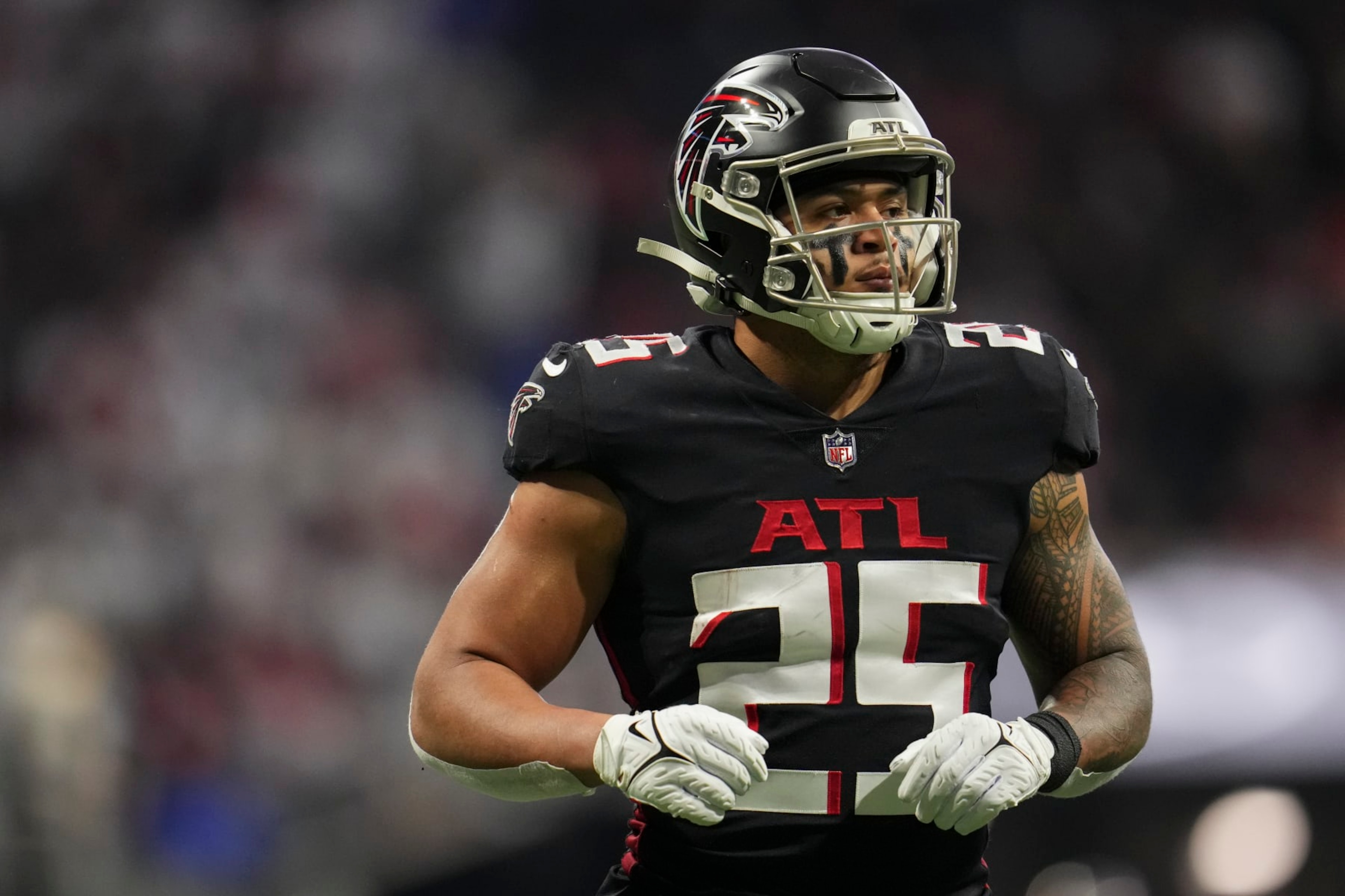 ATLANTA, GA - JANUARY 08: Tyler Allgeier #25 of the Atlanta Falcons gets set against the Tampa Bay Buccaneers at Mercedes-Benz Stadium on January 8, 2023 in Atlanta, Georgia. (Photo by Cooper Neill/Getty Images) ATLANTA, GA - JANUARY 08: Tyler Allgeier #25 of the Atlanta Falcons gets set against the Tampa Bay Buccaneers at Mercedes-Benz Stadium on January 8, 2023 in Atlanta, Georgia. (Photo by Cooper Neill/Getty Images)